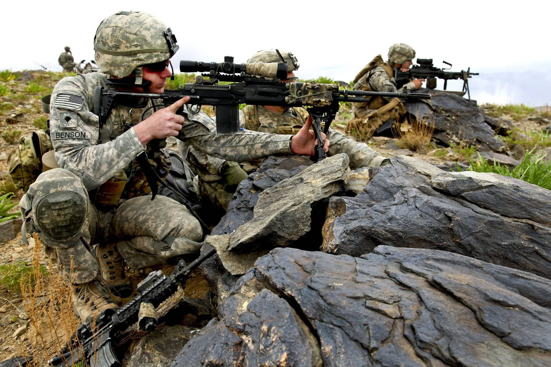 Para Commandos Perched On Rocks