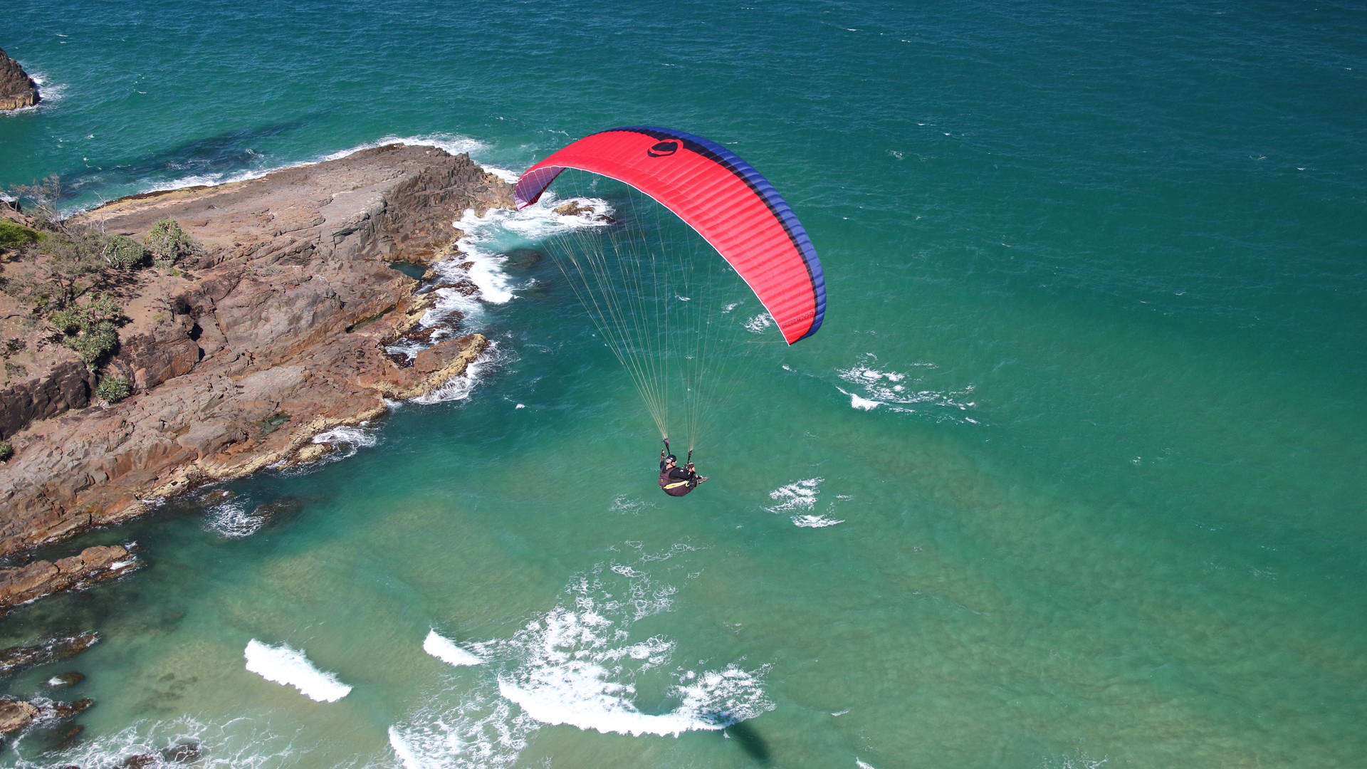 Paragliding Above Sea Background