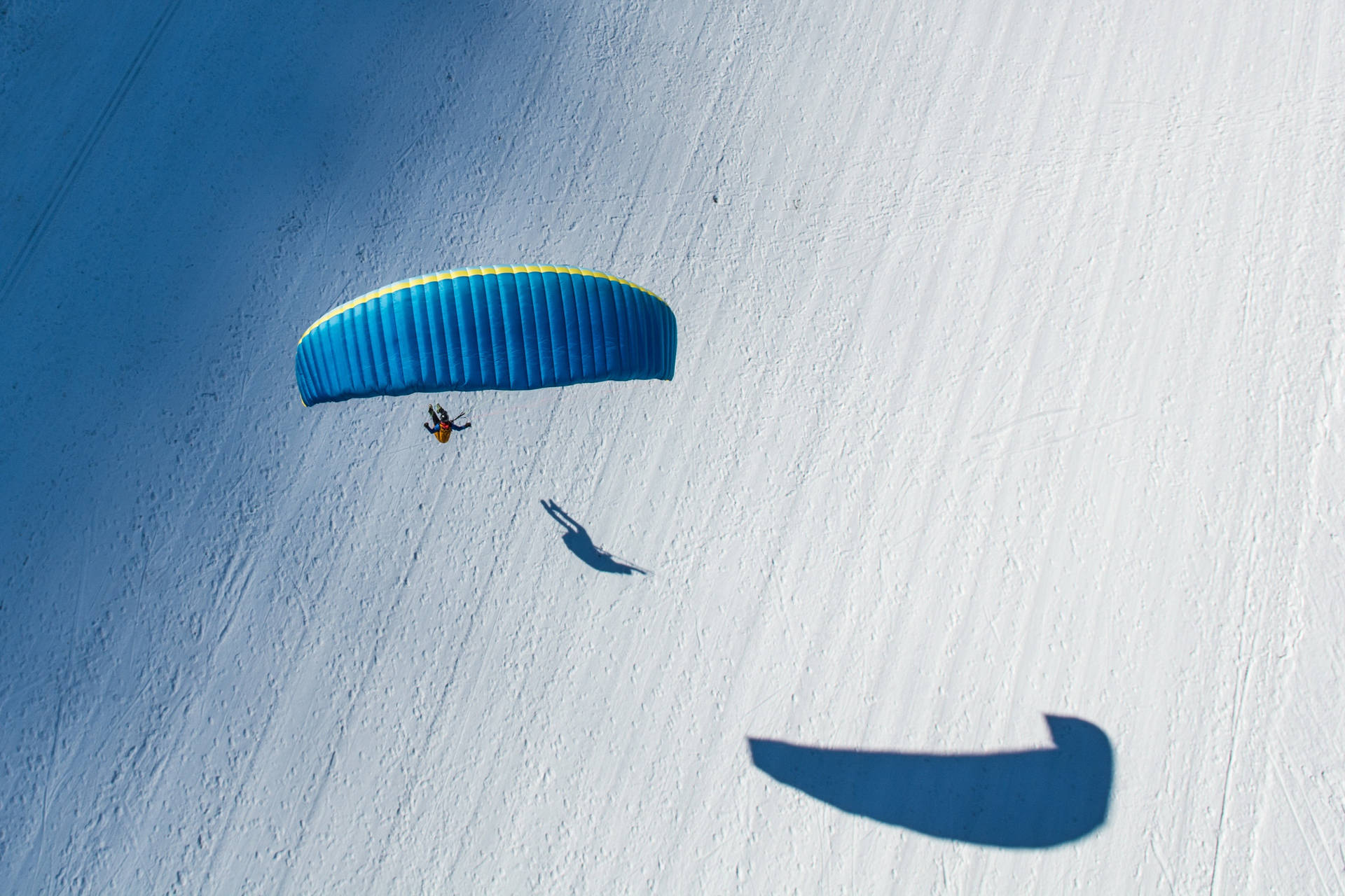 Paragliding Above Snow Background