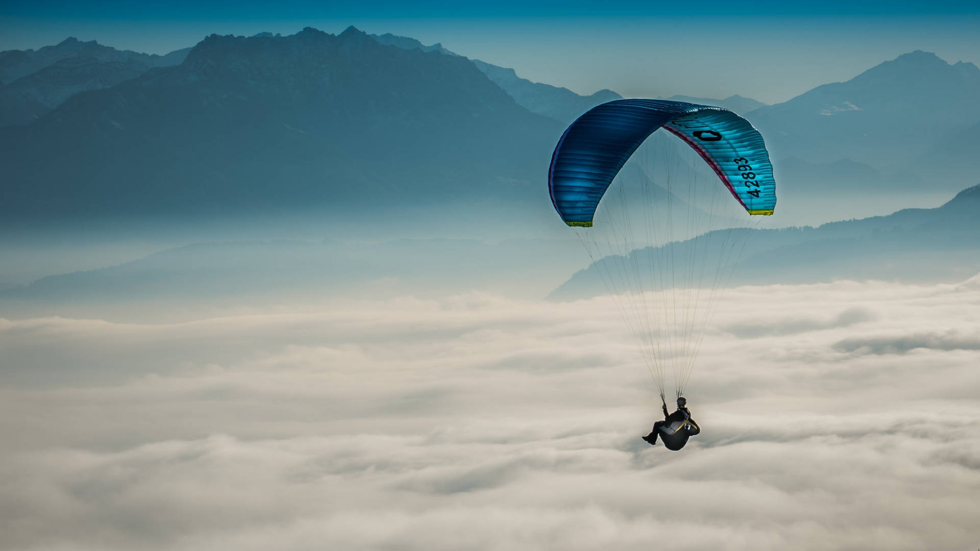 Paragliding Above Thick Clouds Background