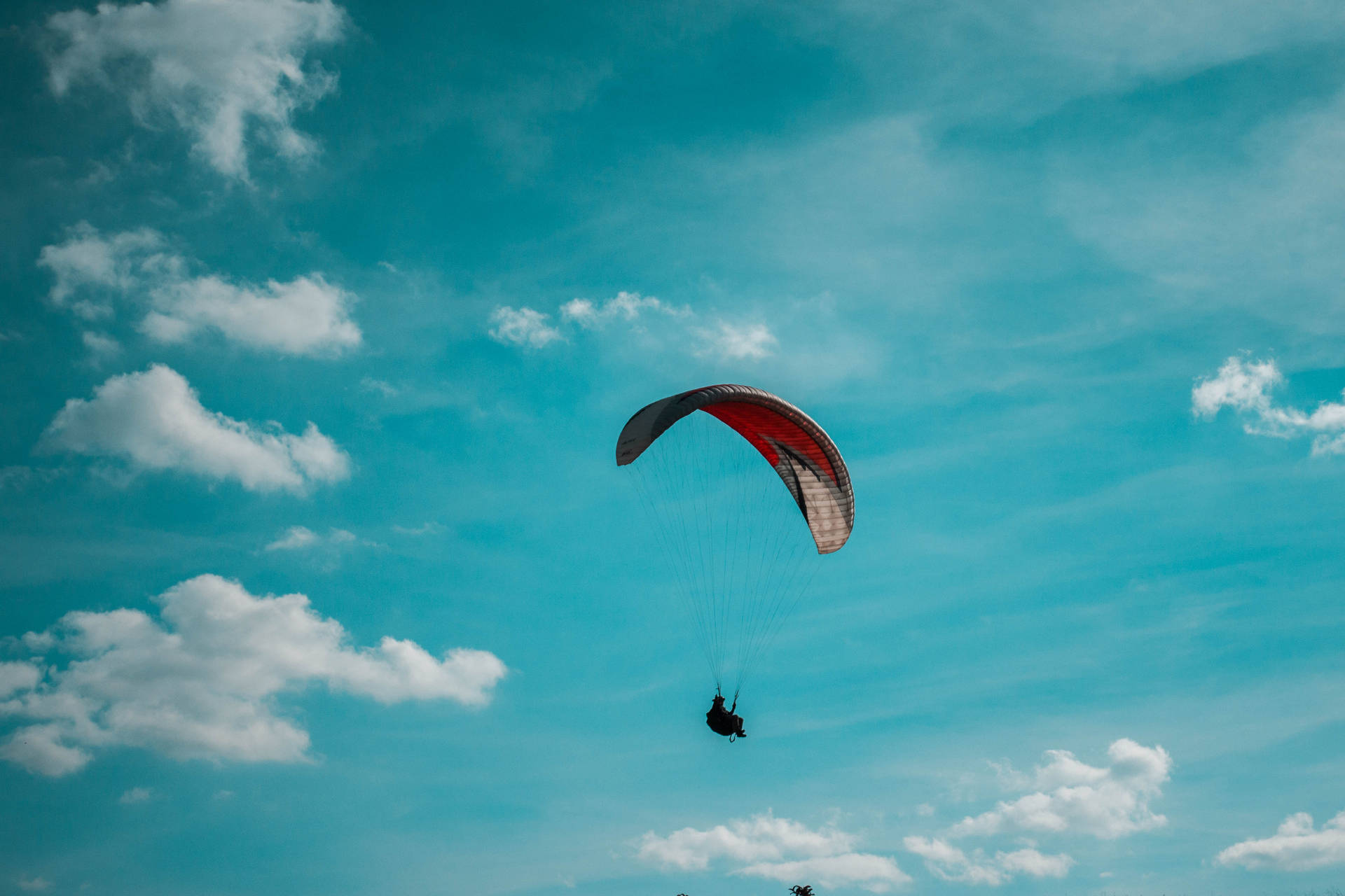 Paragliding High In The Sky