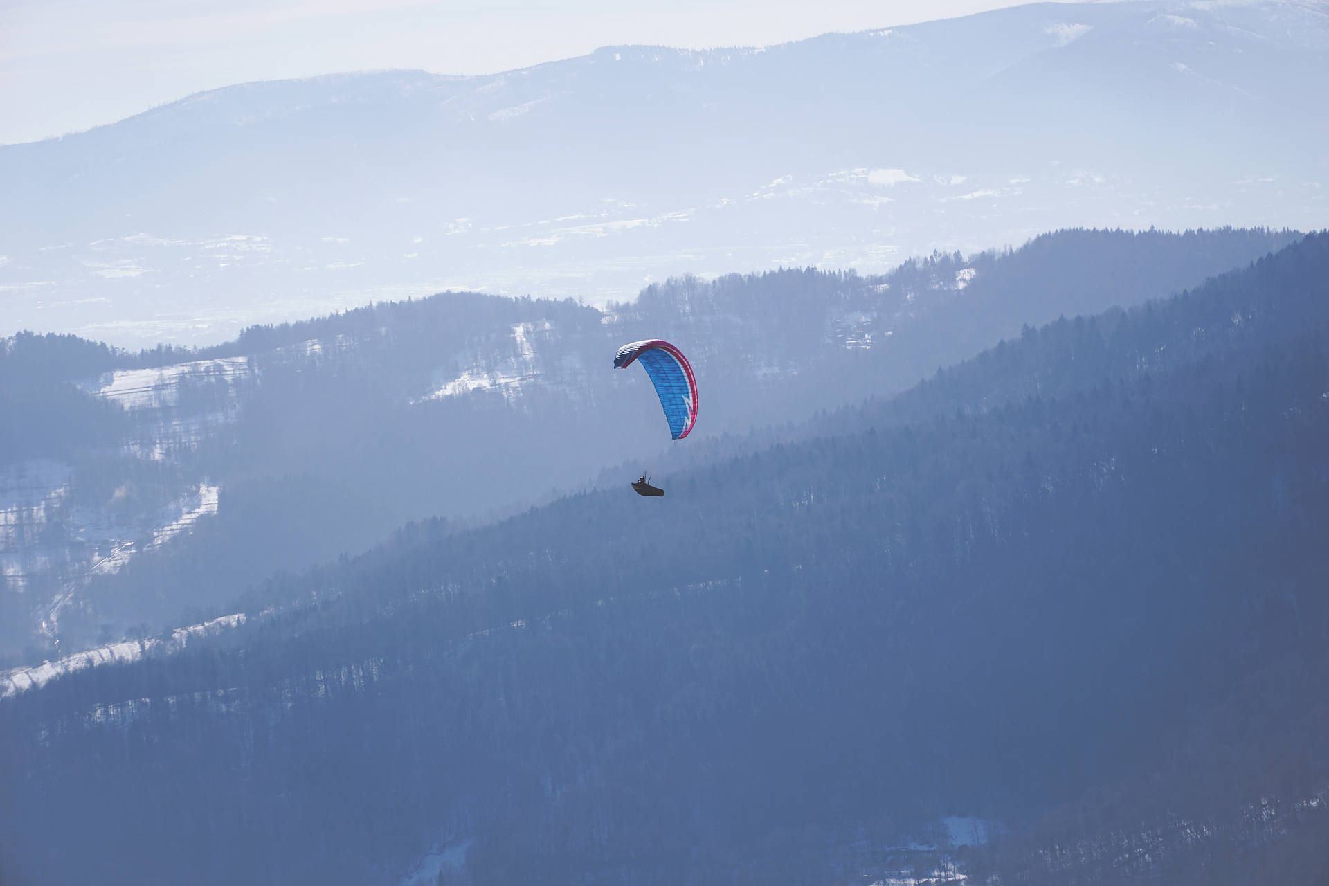 Paragliding Over Mountain Ranges