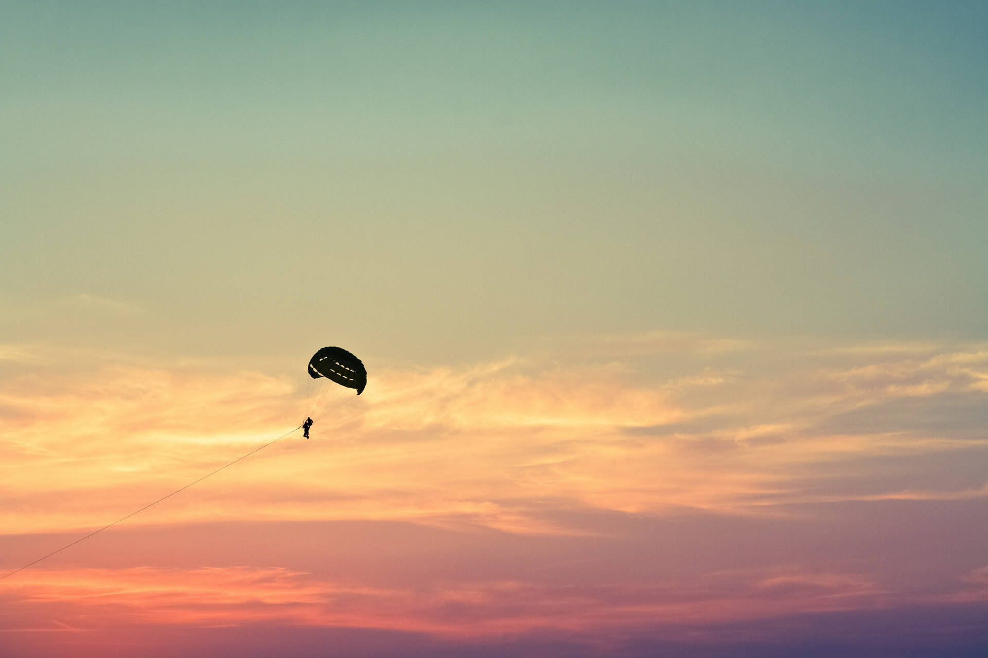 Paragliding Pastel Sunset Background