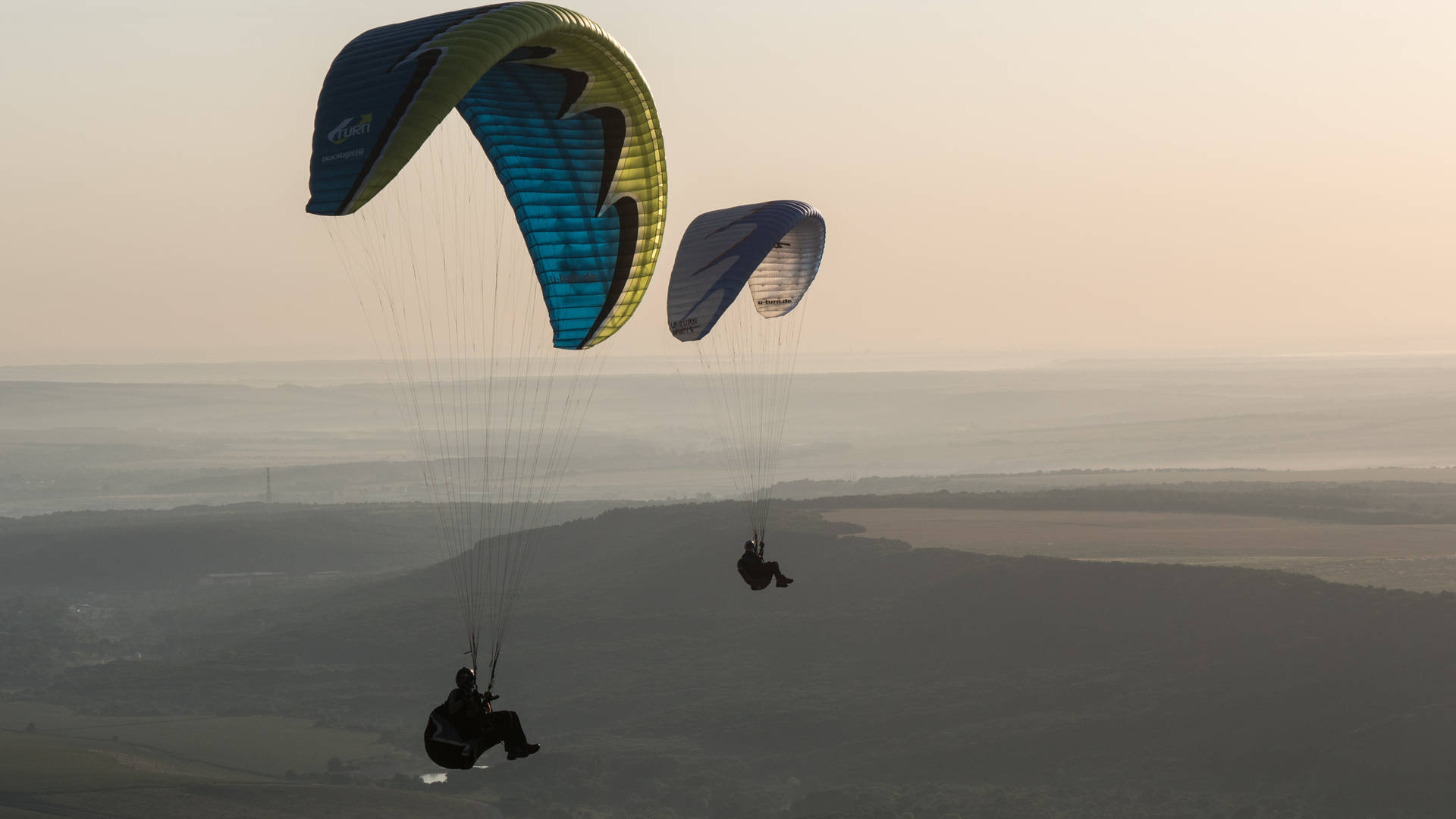 Paragliding With Desert Scenery Background