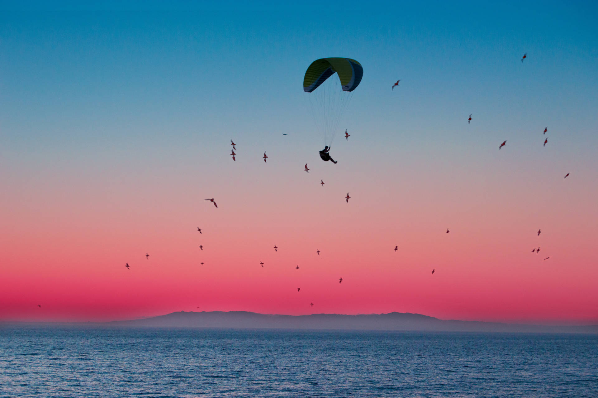 Paragliding With Sunset View Background