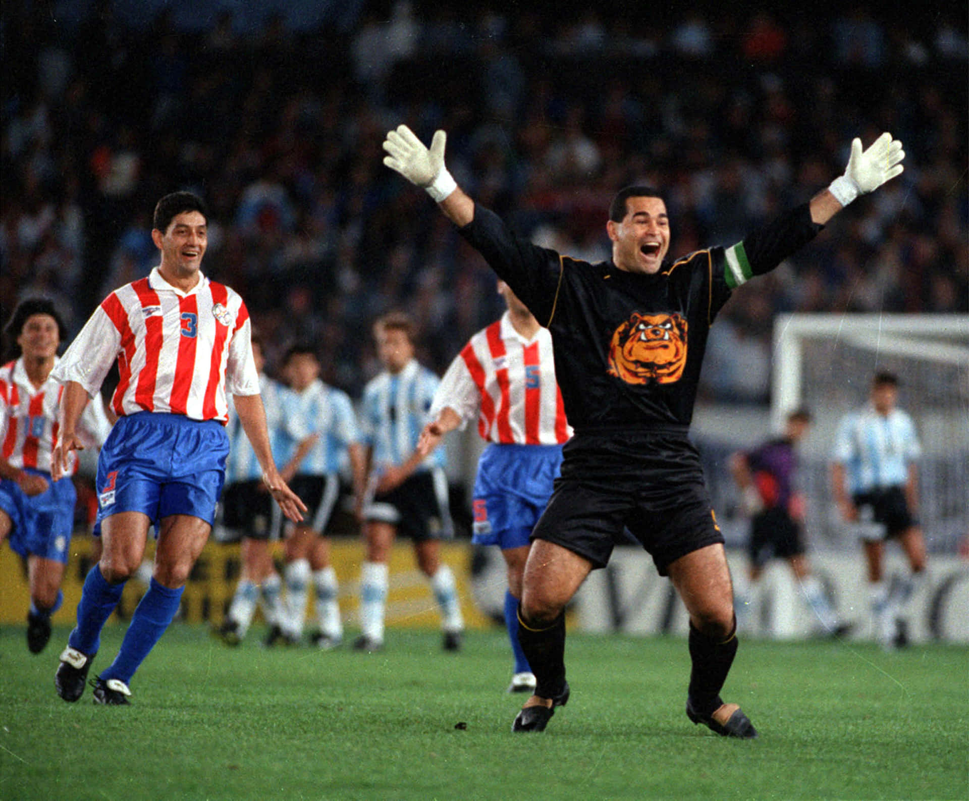 Paraguayan Footballer Jose Luis Chilavert Celebrating A Goal Background