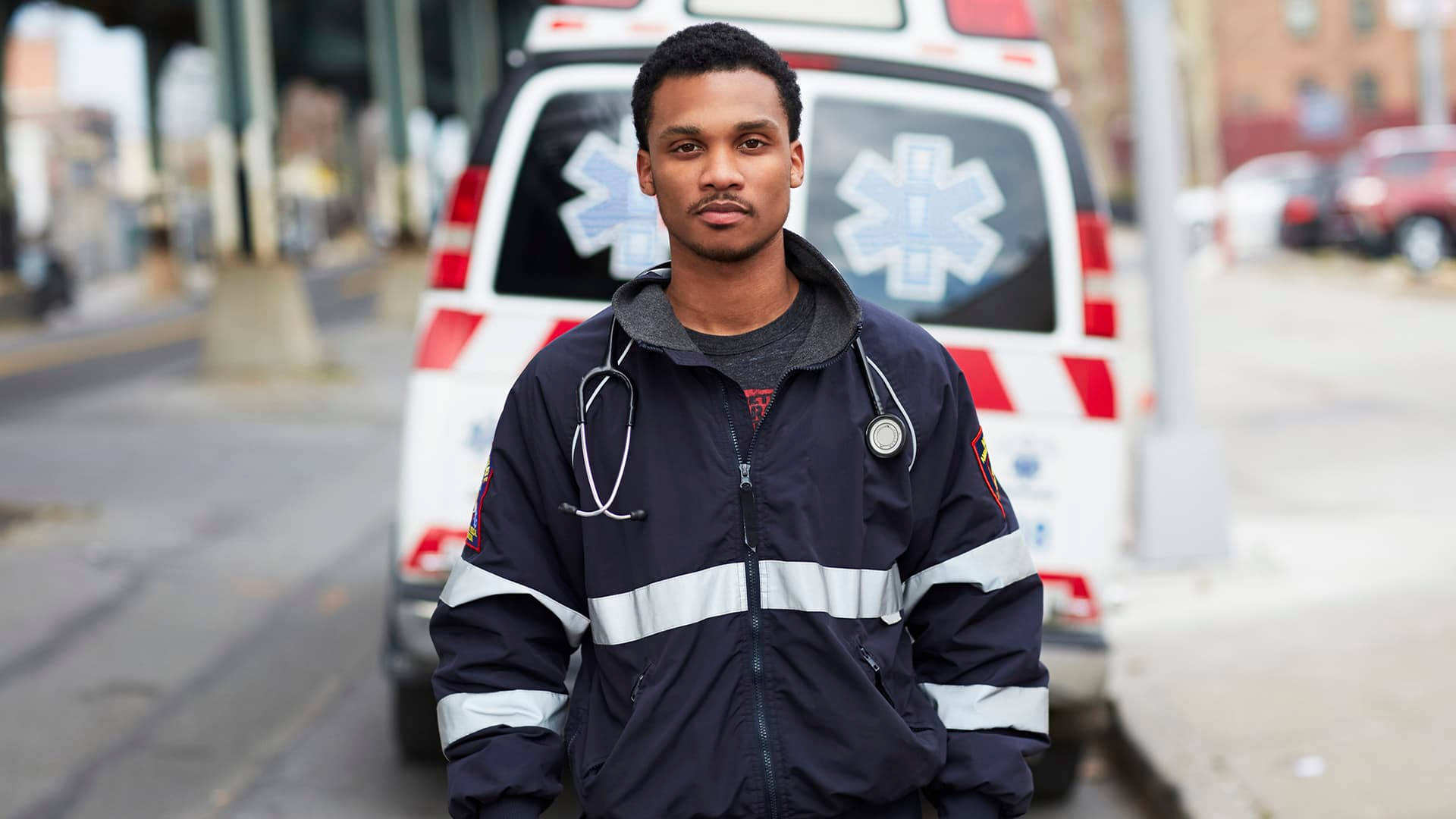 Paramedic Man In Uniform Background