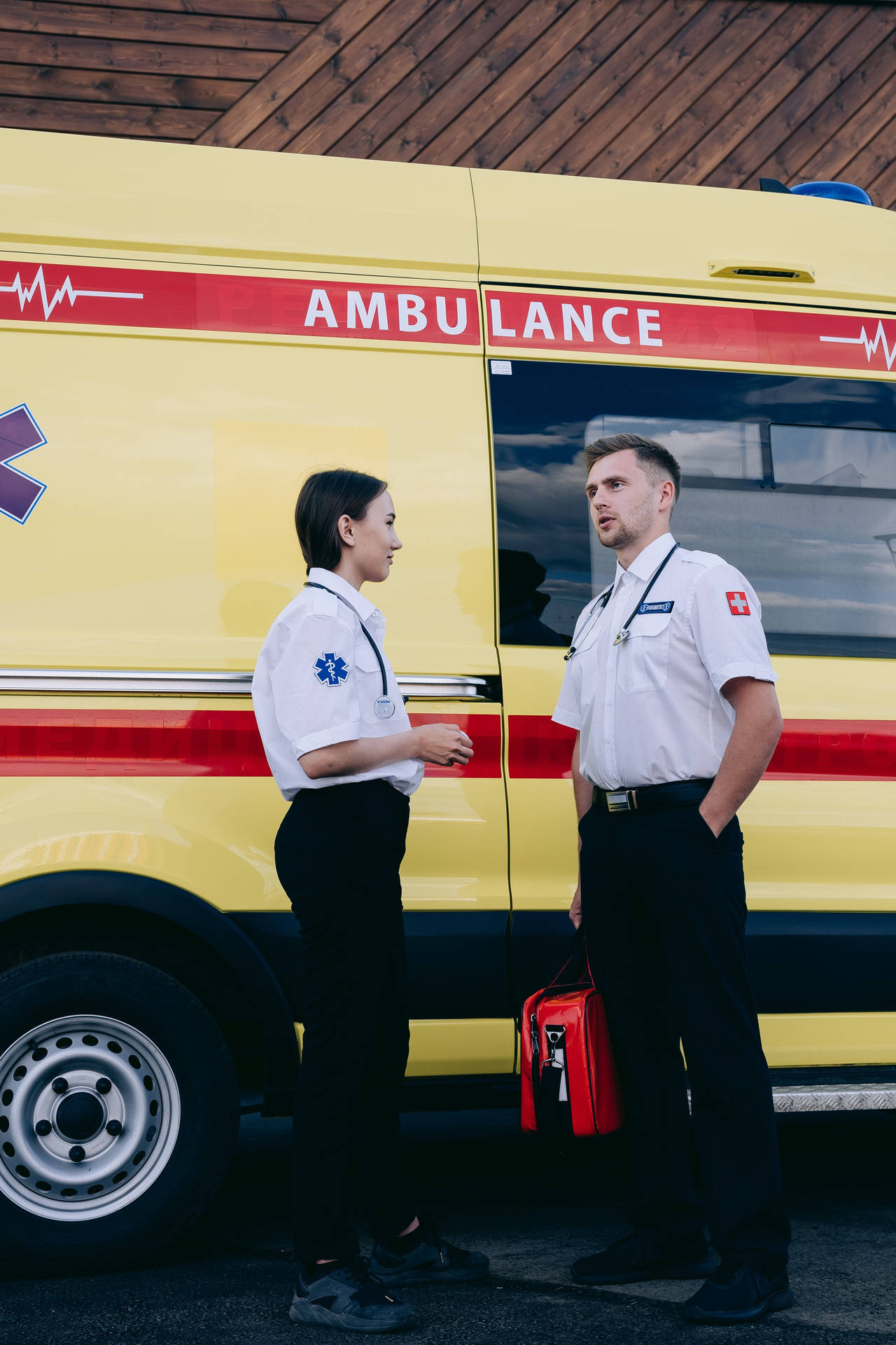 Paramedic Members Talking Background