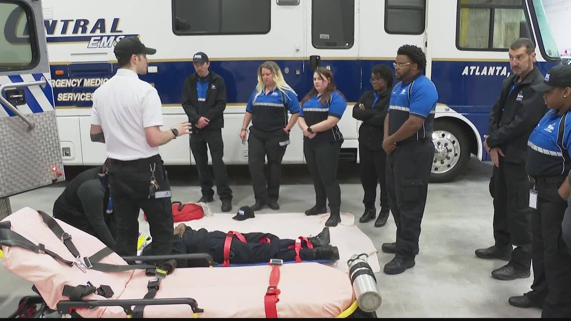 Paramedic Team In Workshop Background