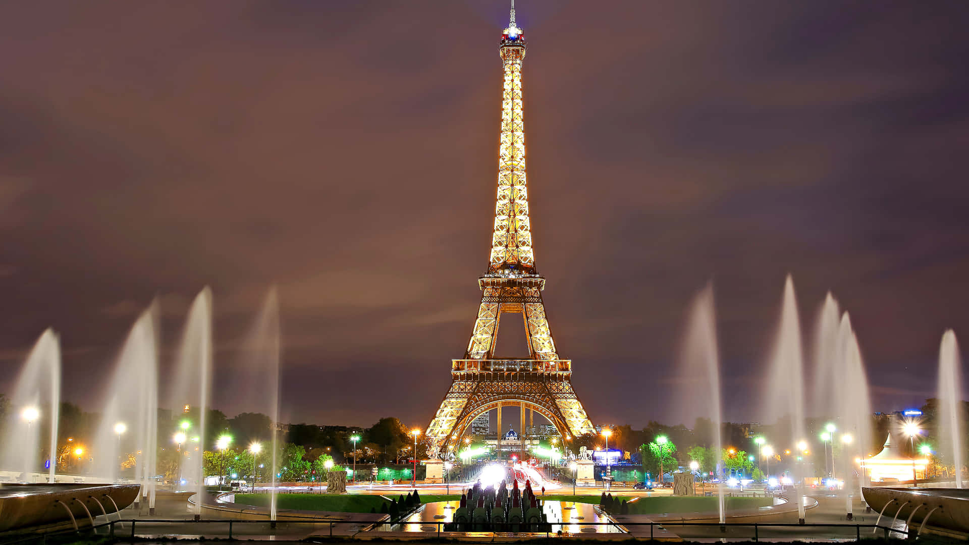 Paris At Night With Fountain Background