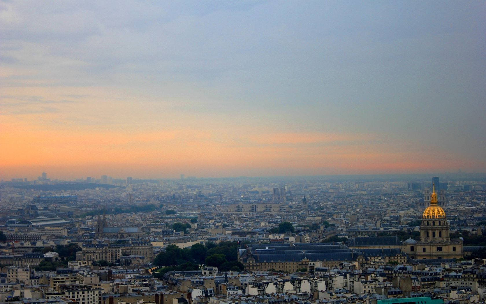 Paris Skyline In Hues Of Calming Blue And Orange.