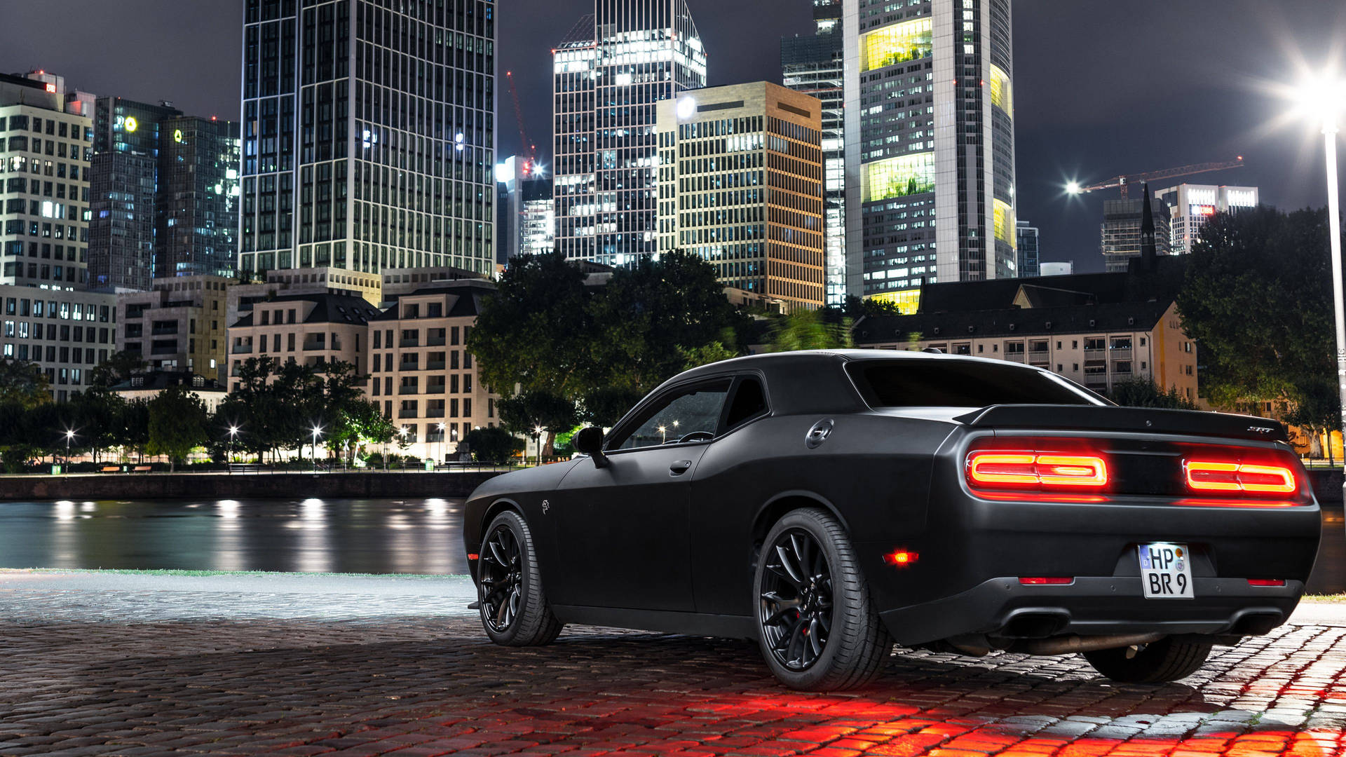 Parked Black Dodge Challenger Demon 4k Facing Buildings Background