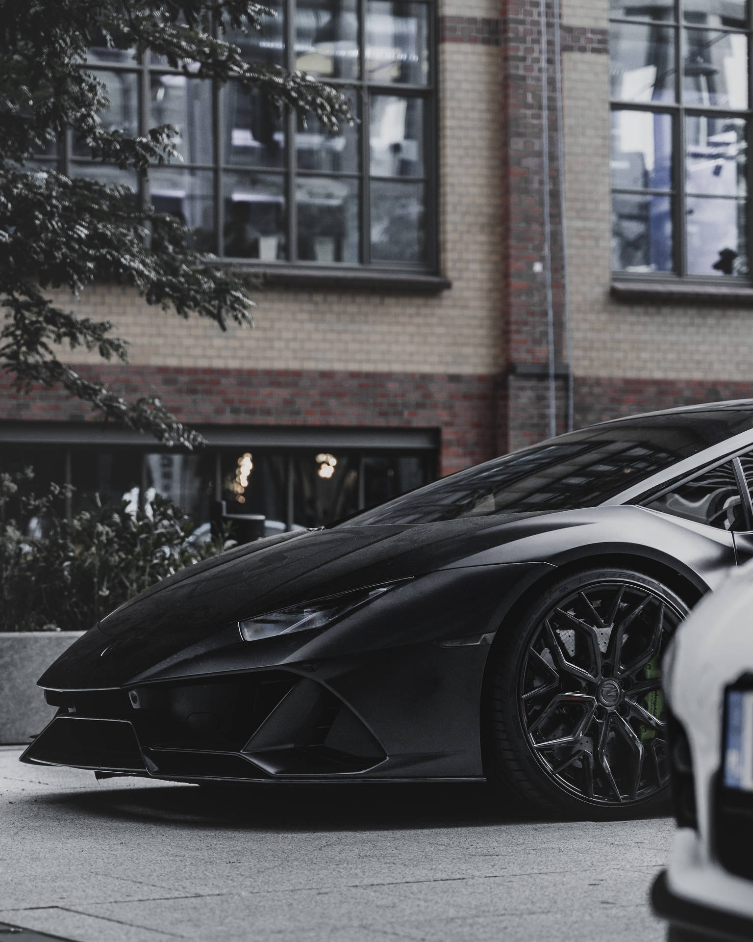 Parked Black Lamborghini Galaxy Background