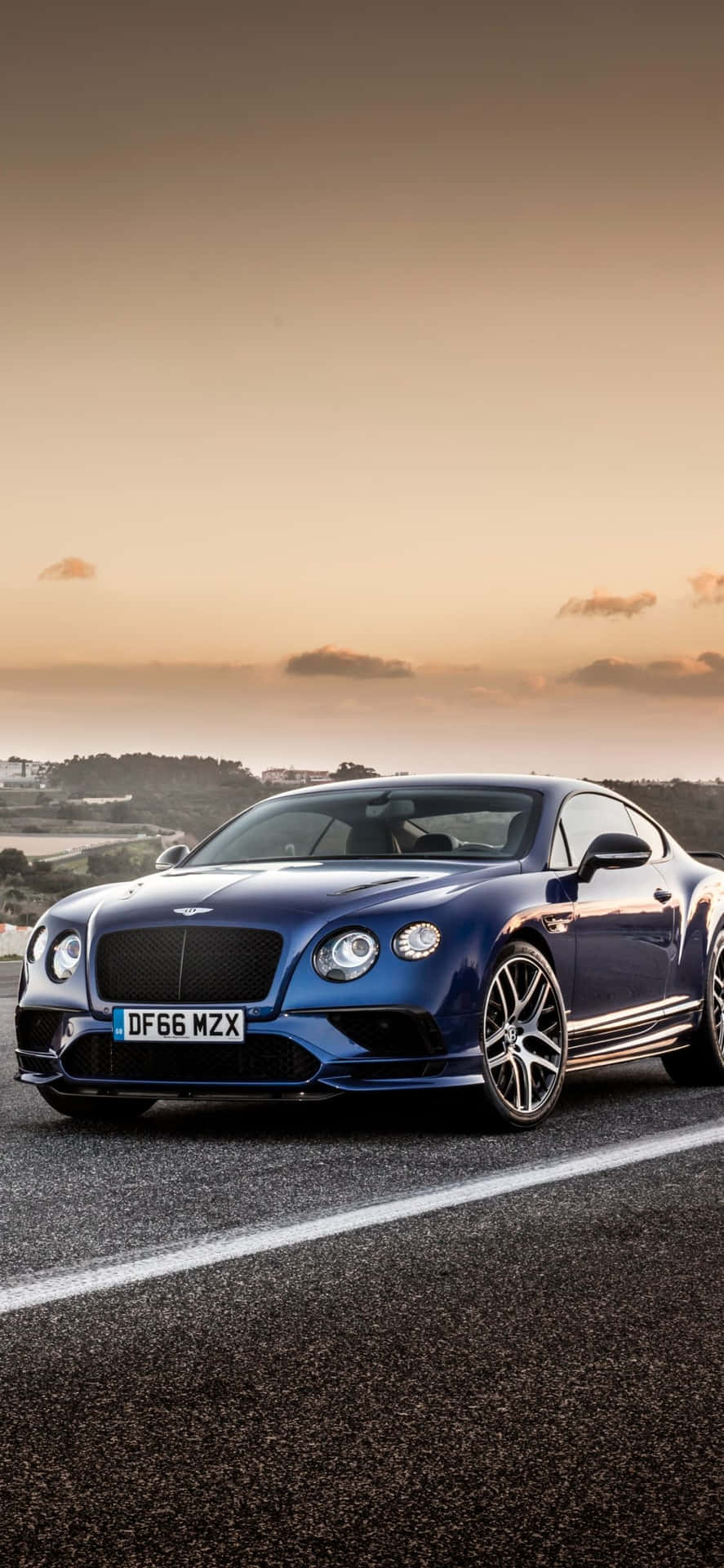 Parked Blue Bentley Iphone Background