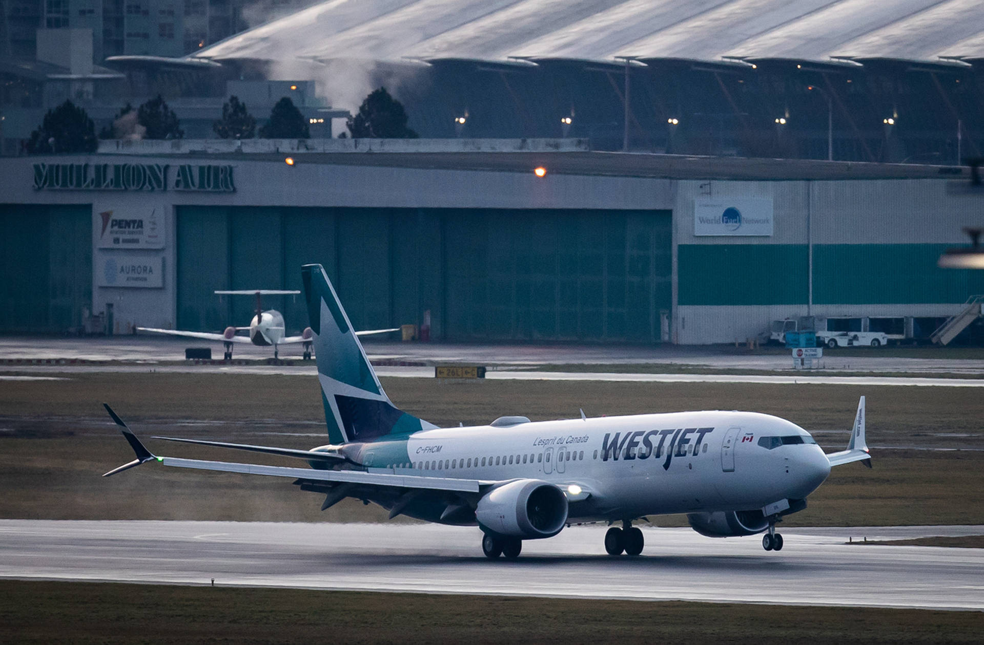 Parked Westjet Airplane Background