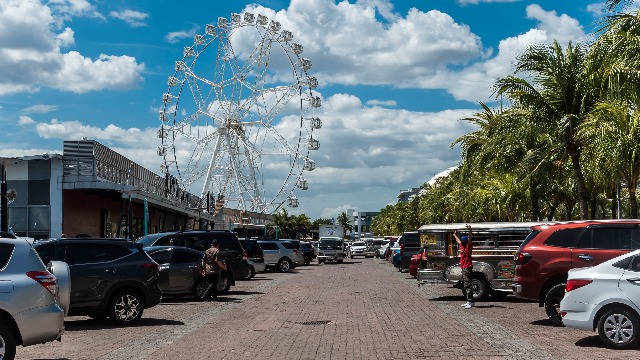 Parking Space With Ferris Wheel