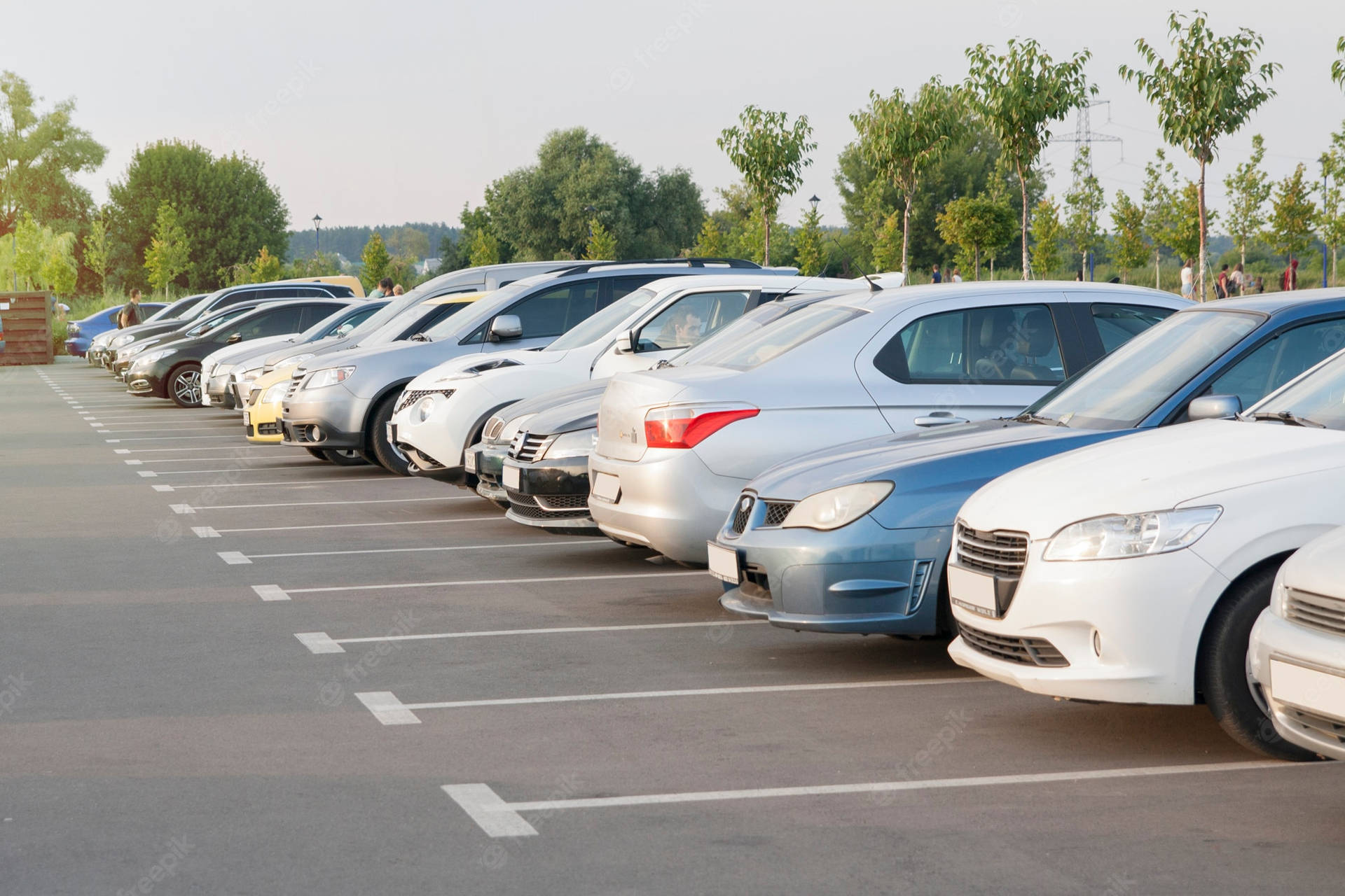 Parking Space With Lined-up Cars Background