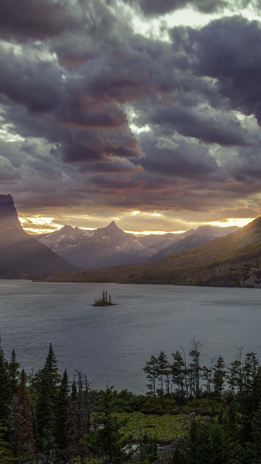 Particular Weather At Glacier National Park Background