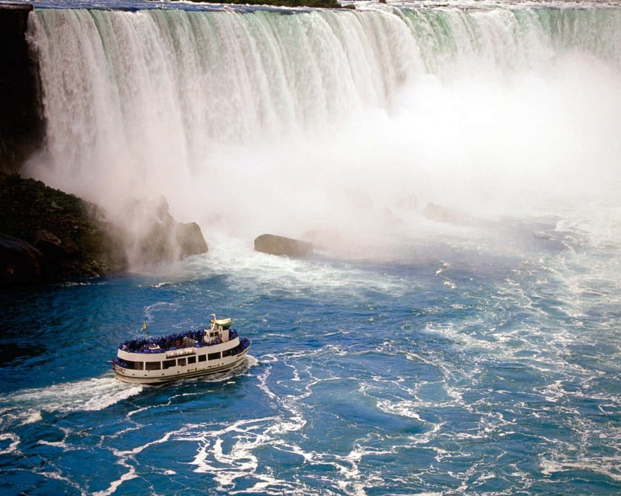 Passenger Ship In Niagara Falls Canada Background