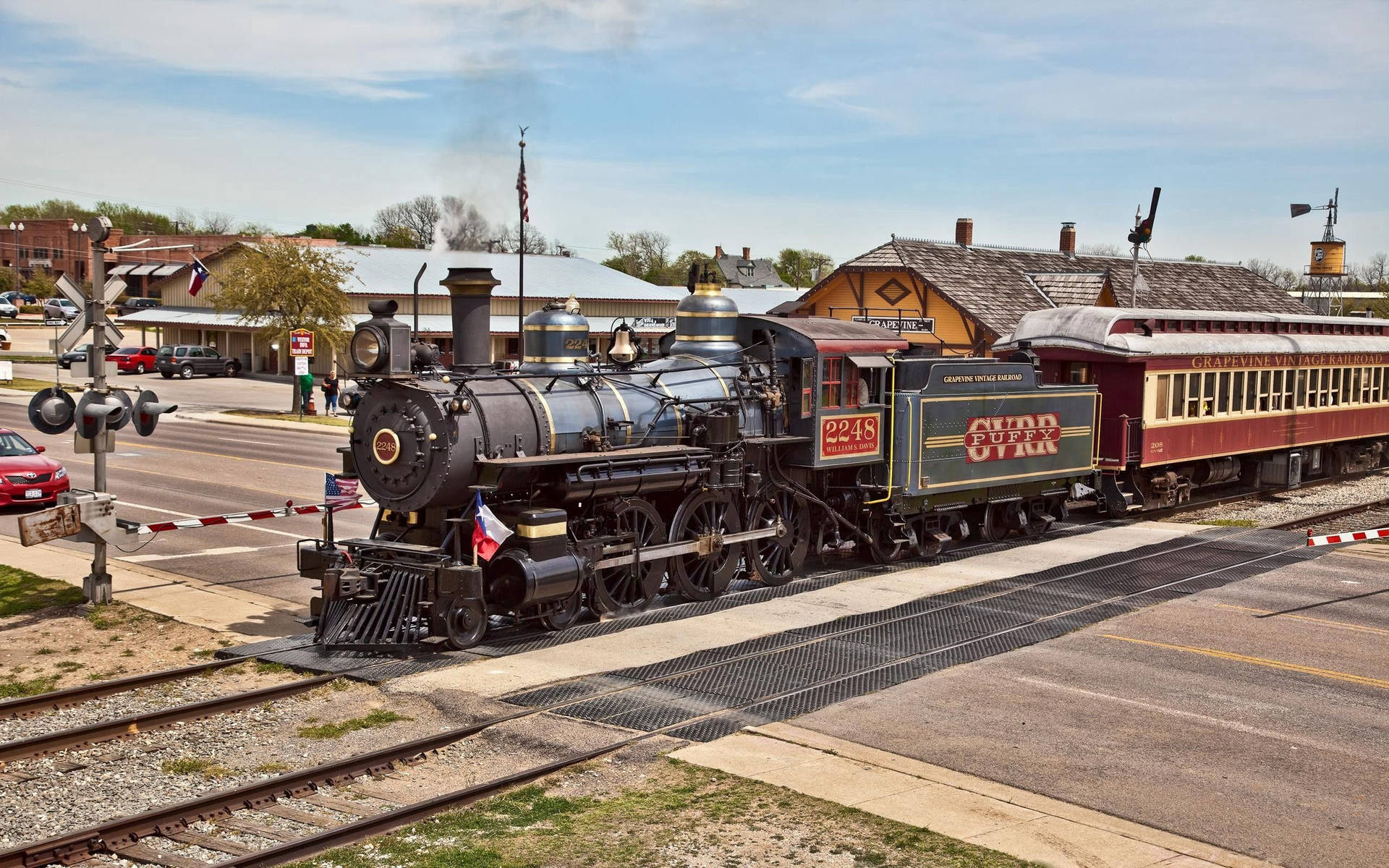 Passengers Taking A Vintage Steam Locomotive Train Ride Background