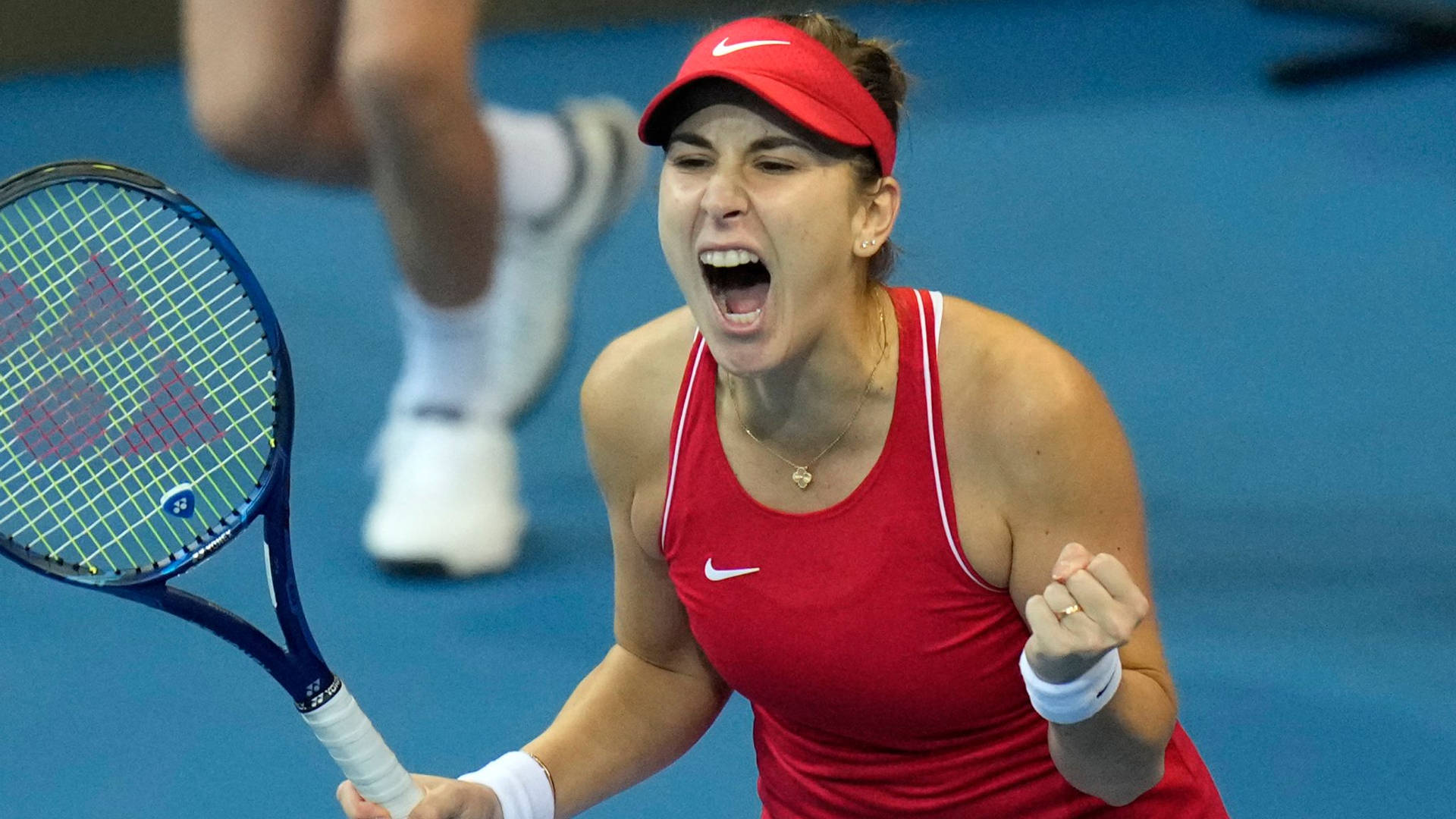 Passionate Belinda Bencic Celebrating A Win Background