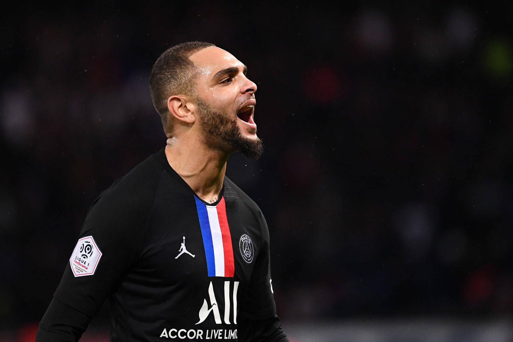 Passionate Moment Of Layvin Kurzawa On The Field Background