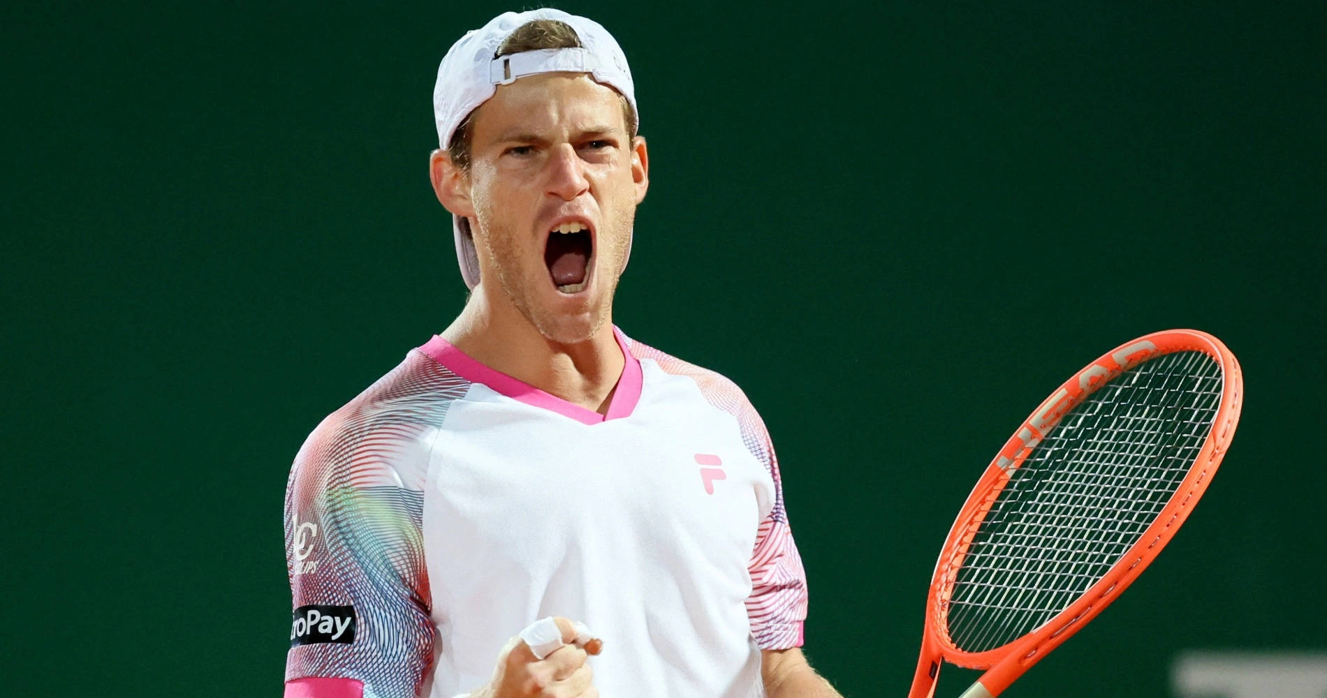 Passionate Tennis Pro, Diego Schwartzman Expressing Vigor During A Match Background