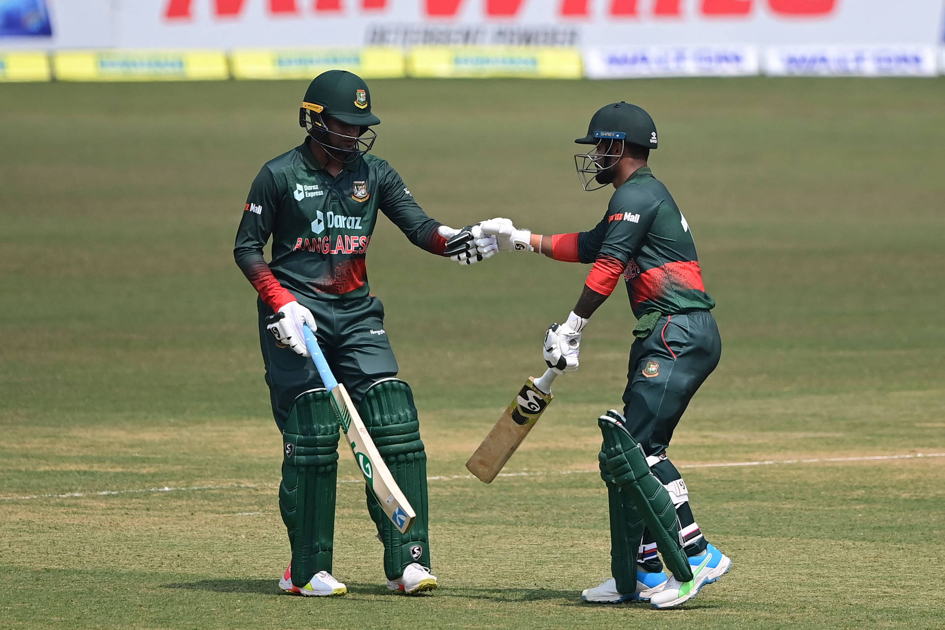 Passionate Unity - Bangladesh Cricket Team Celebrating A Victory Background