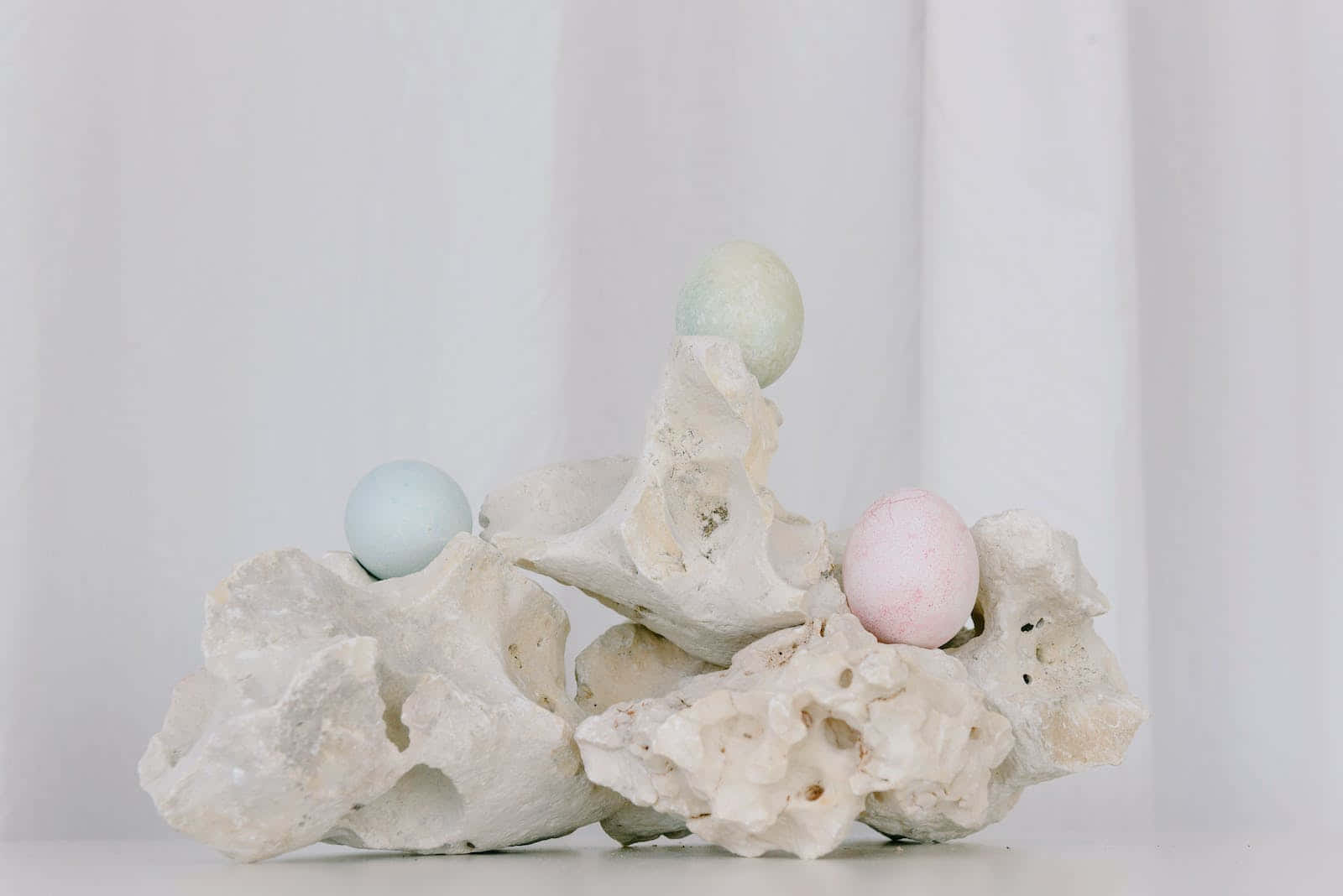 Pastel Easter Eggs On Rock