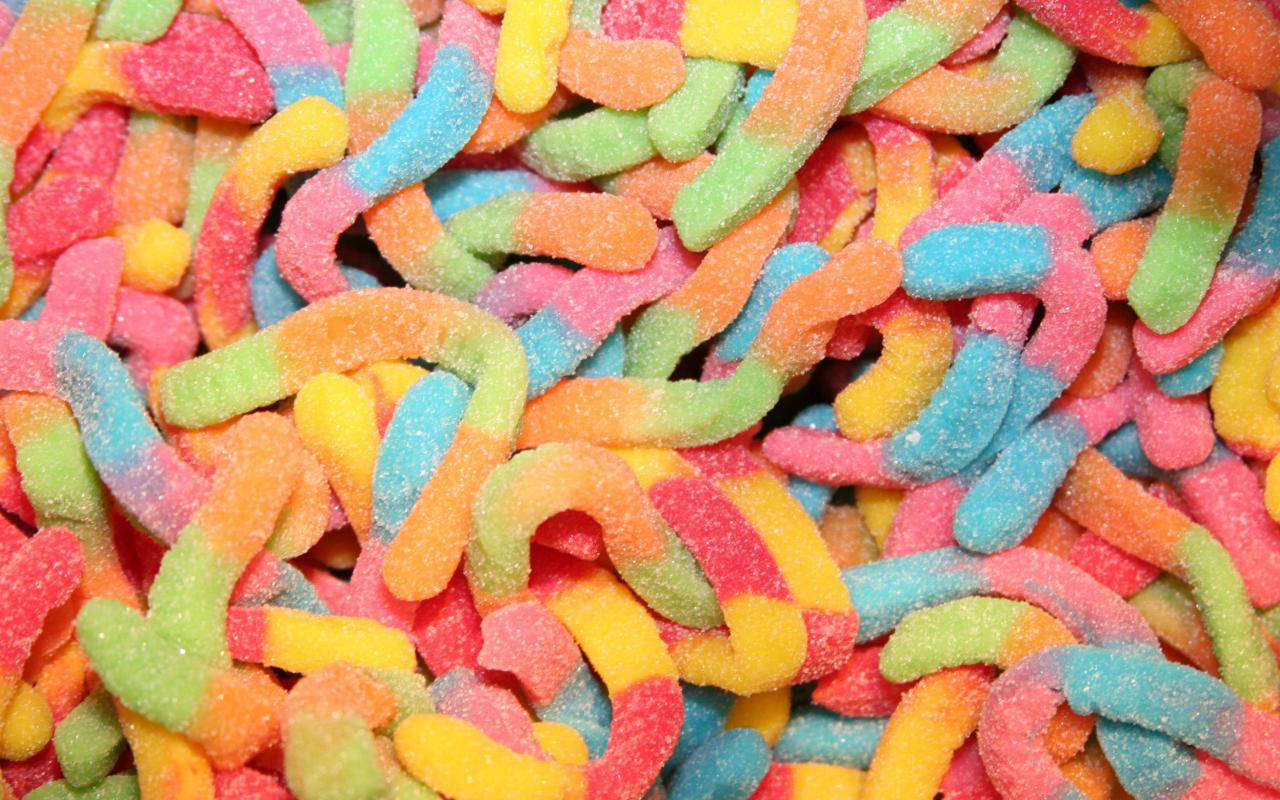 Pastel Gummy Worm Candies Background