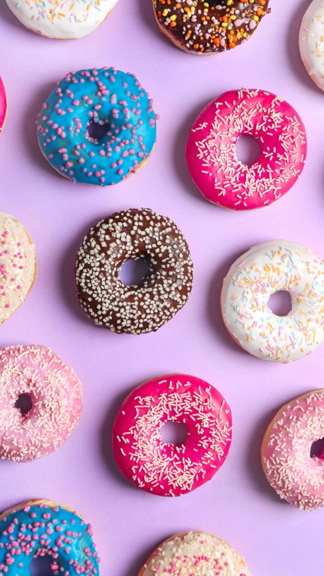 Pastel Phone Colored Donuts Background