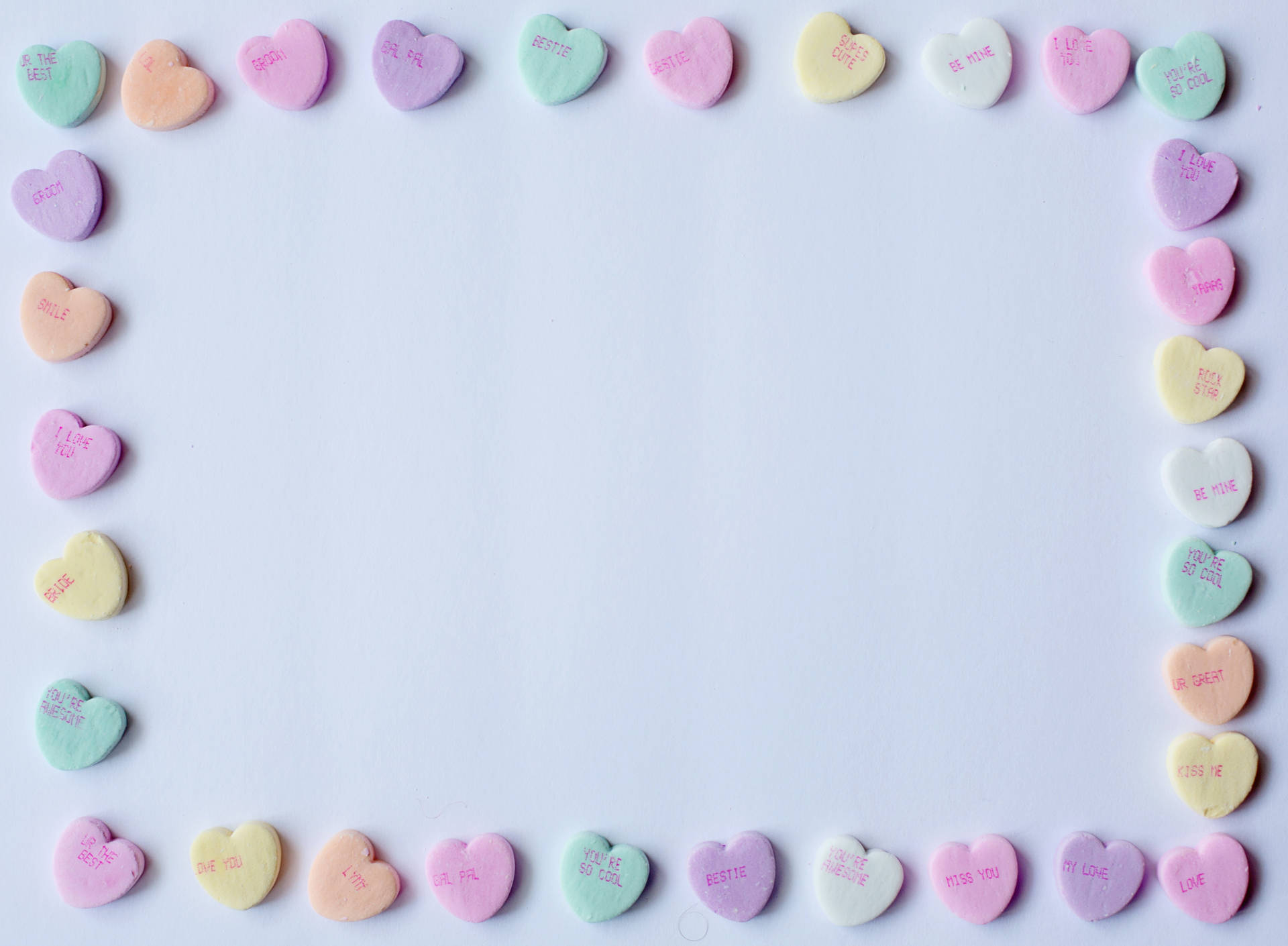 Pastel Pink Heart Candies Forming Border
