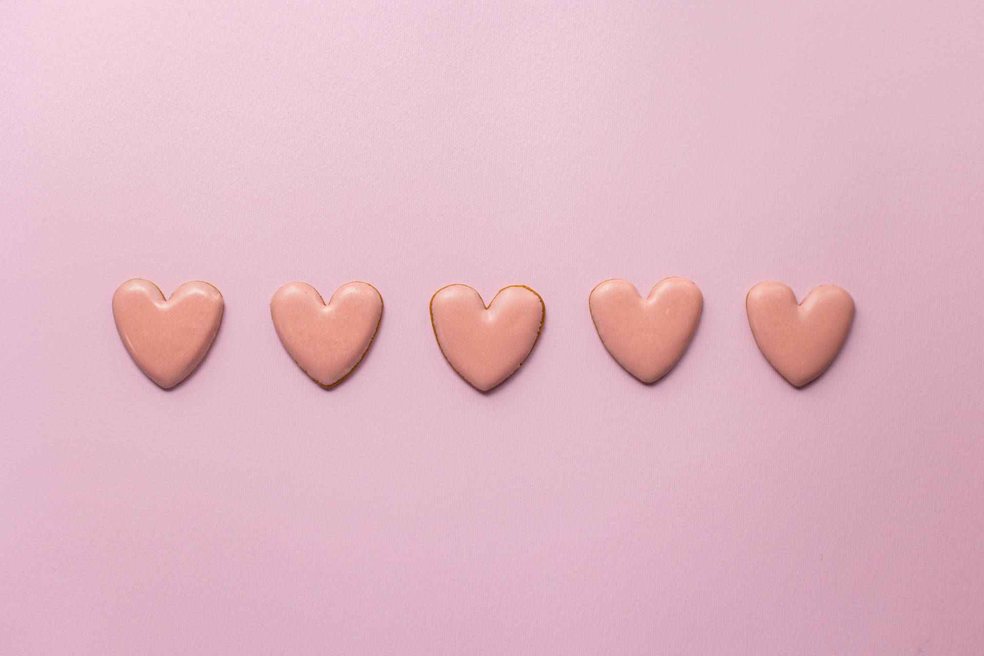 Pastel Pink Heart Sugar Cookies Background