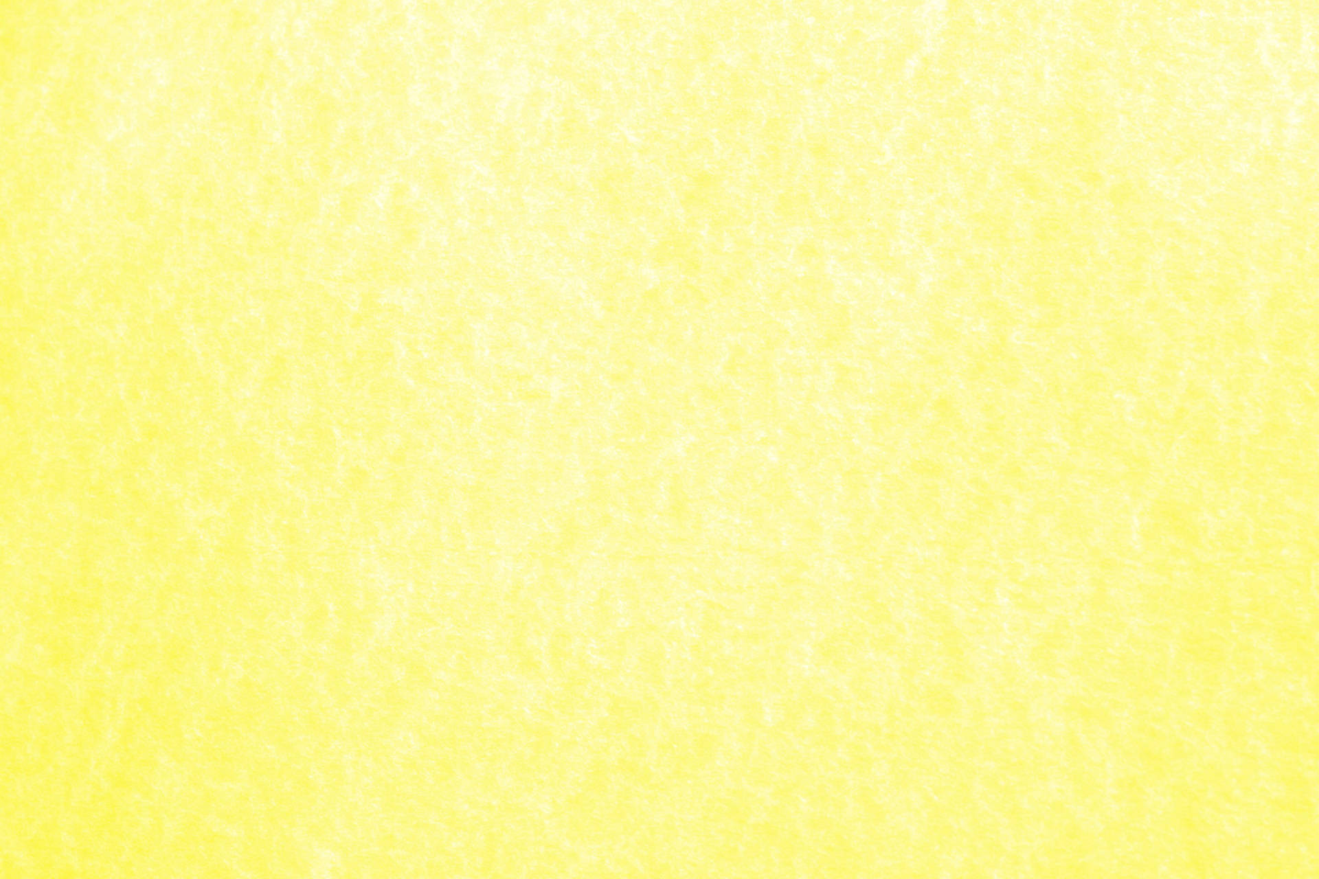 Pastel Plain Yellow Textured Desktop Background