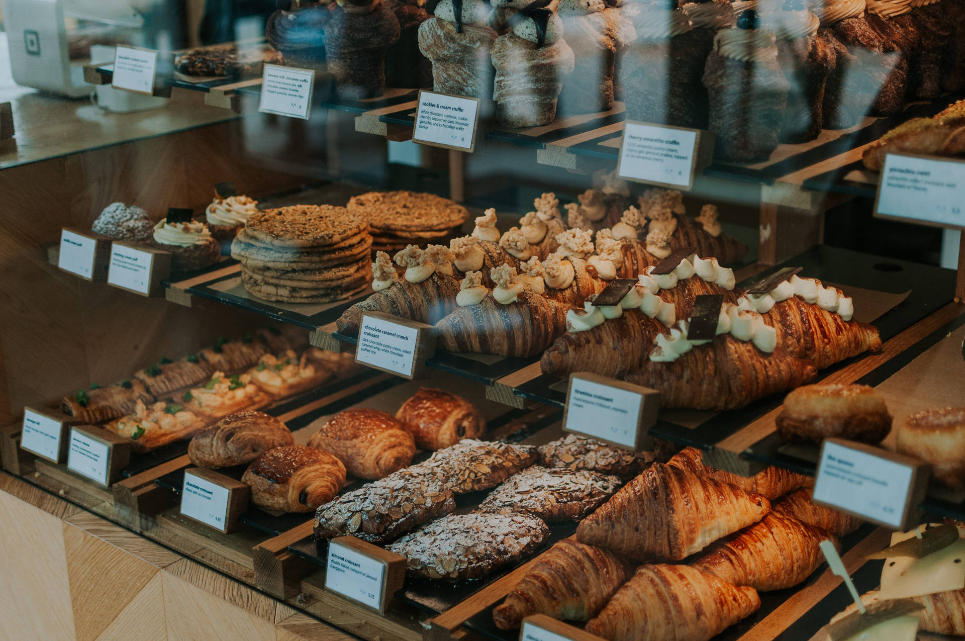 Pastries In Glass Display Background