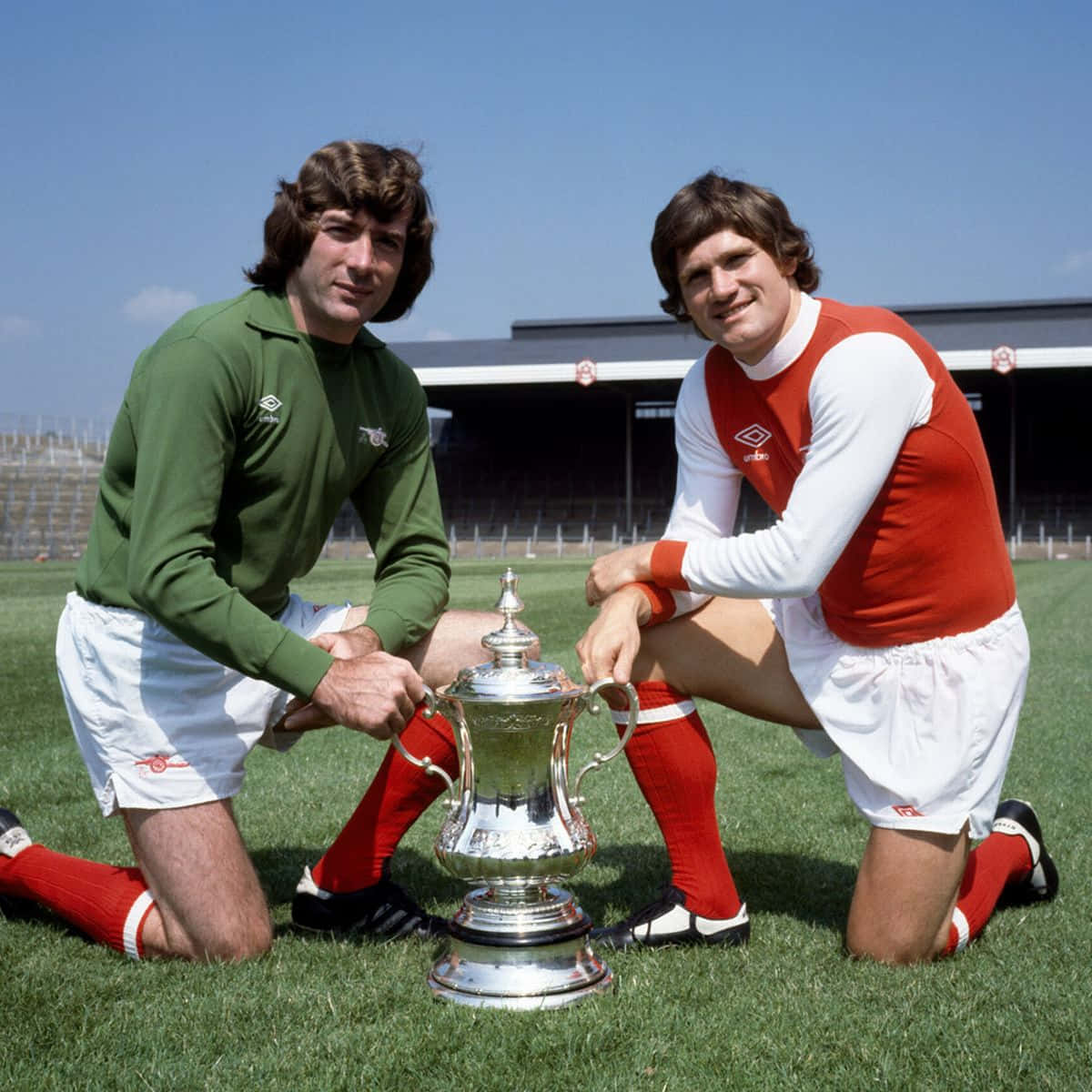 Pat Jennings And Pat Rice With The Fa Cup Background