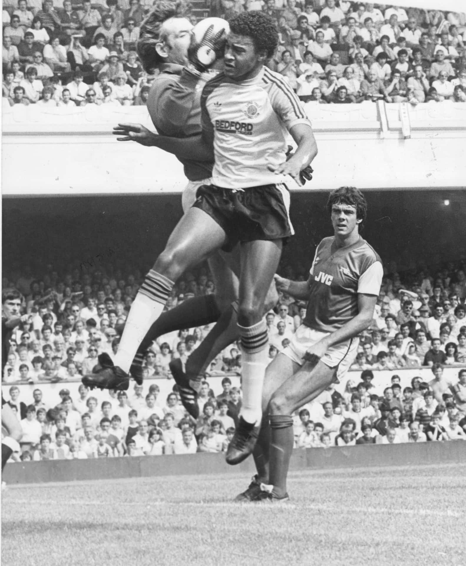 Pat Jennings Versus Paul Elliott Black And White Background