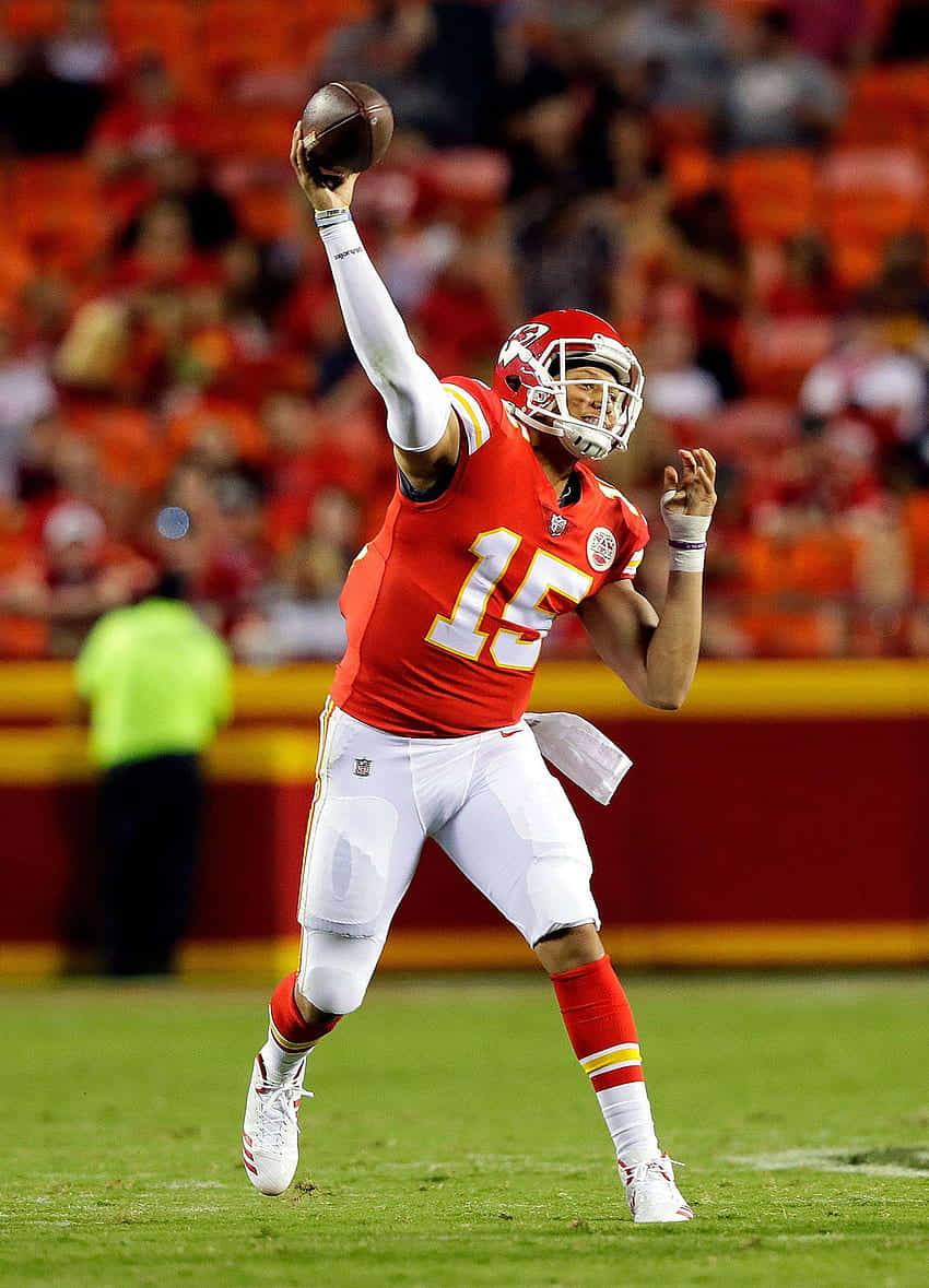 Pat Mahomes Celebrates With His Phone After The Super Bowl Background