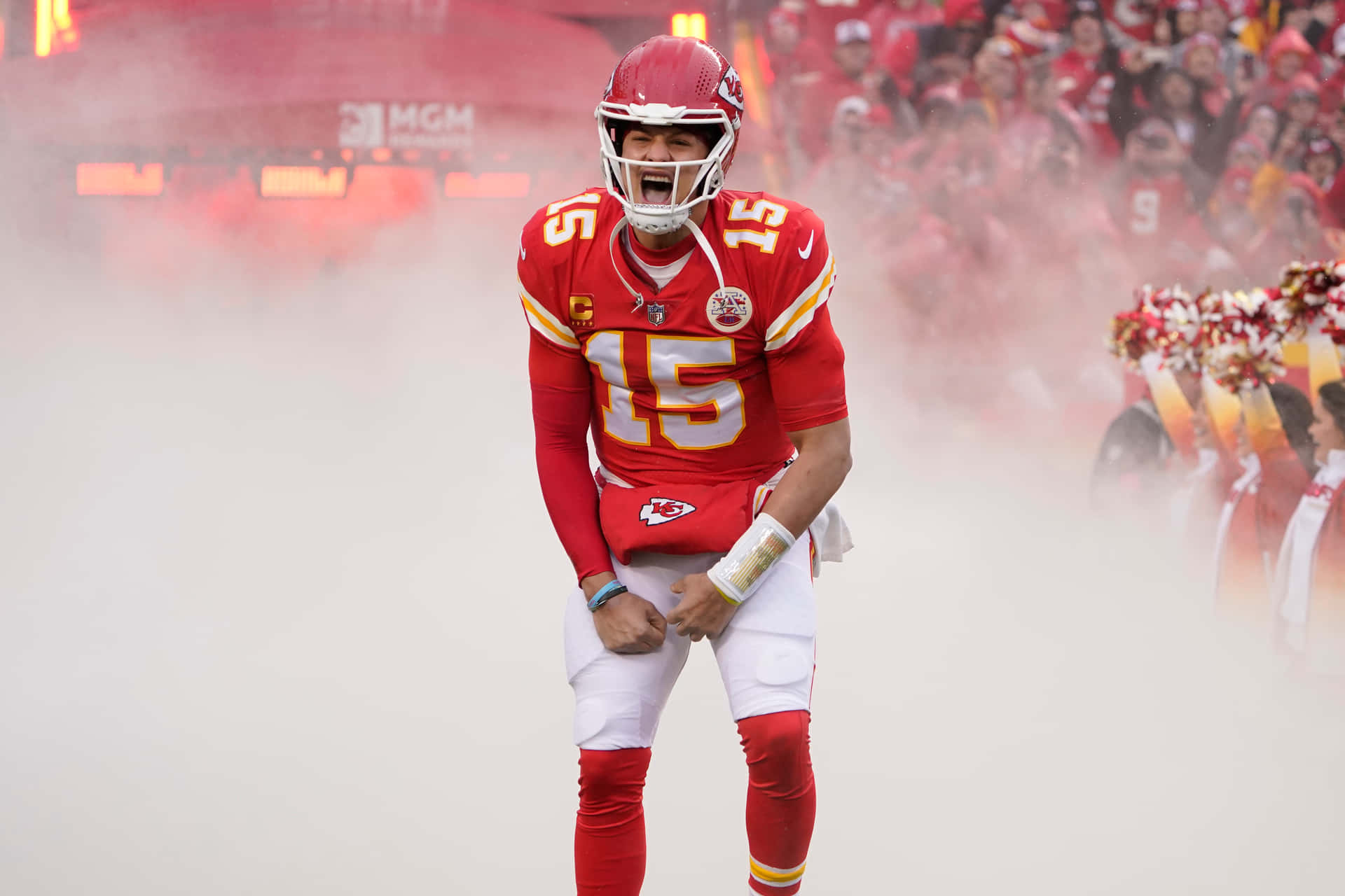Pat Mahomes Holds His New Smartphone Background