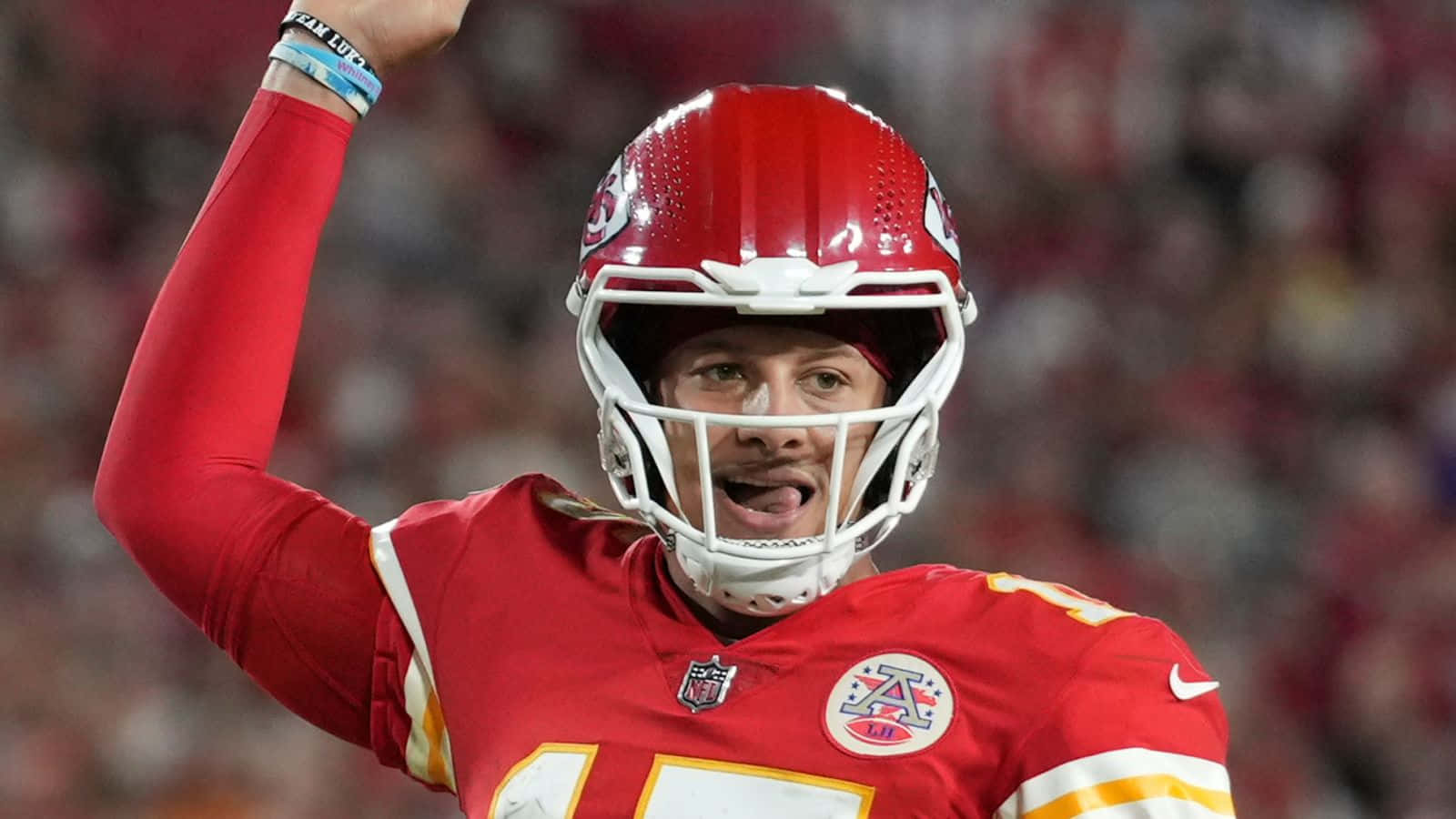 Pat Mahomes With The Kansas City Chief's Championship Rings Background