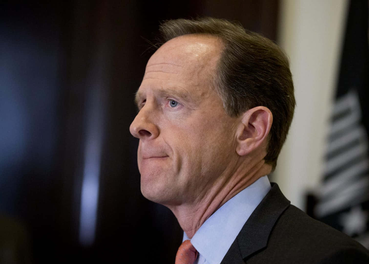 Pat Toomey Biting Lips Background