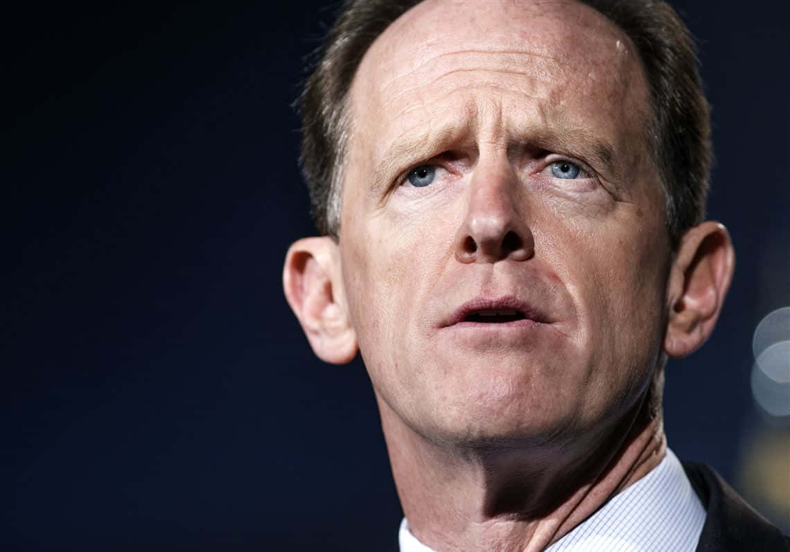 Pat Toomey In Thoughtful Pose Background