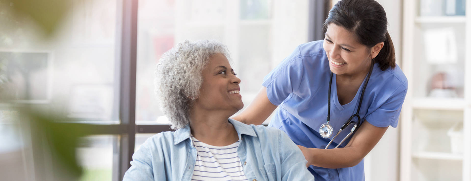 Patient And Nurse Smiling Background