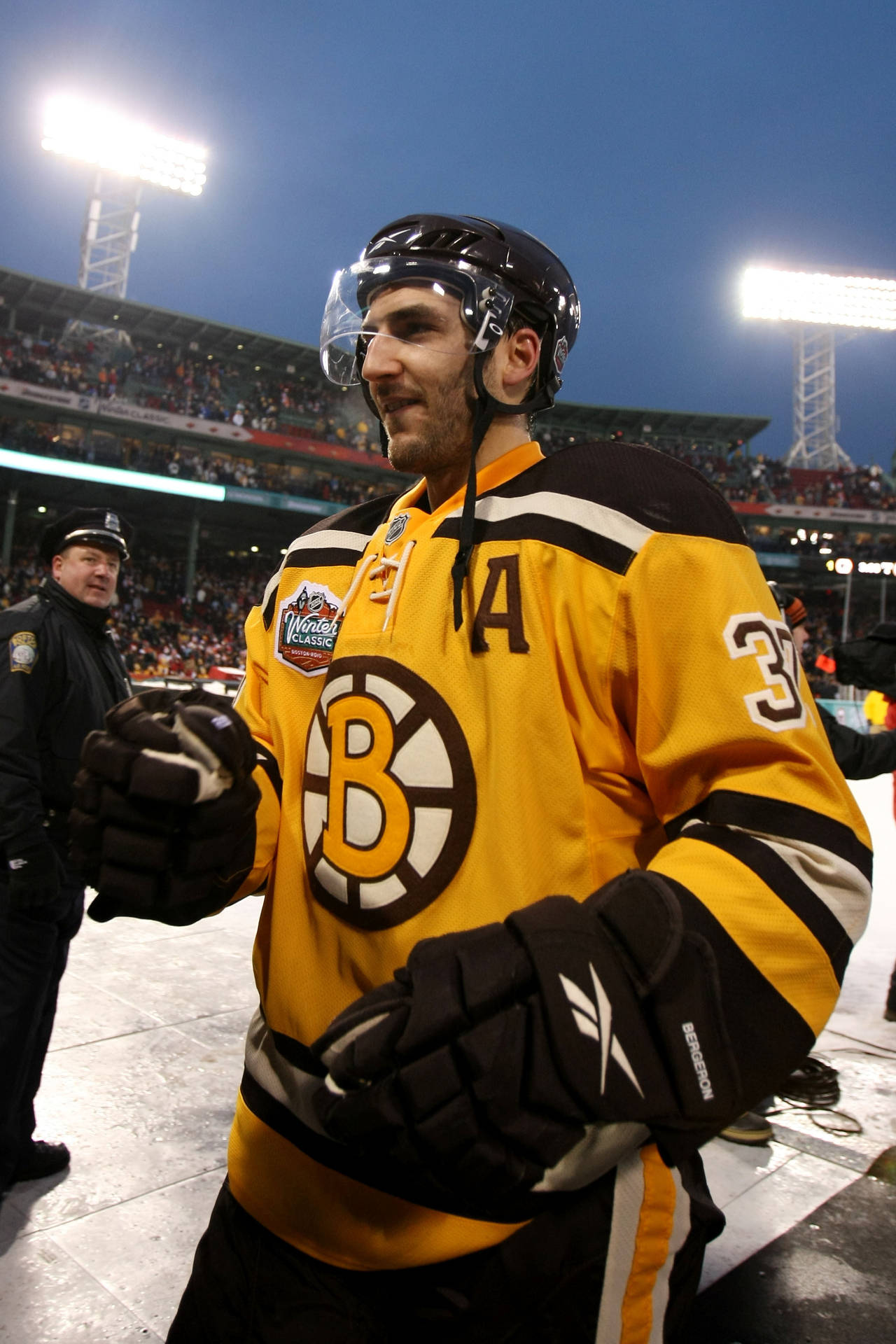 Patrice Bergeron In Action - Boston Bruins Background