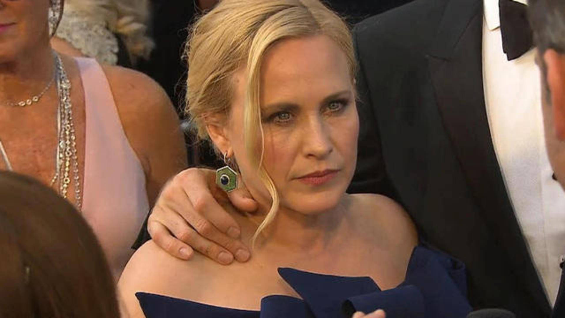 Patricia Arquette Radiates Elegance Background