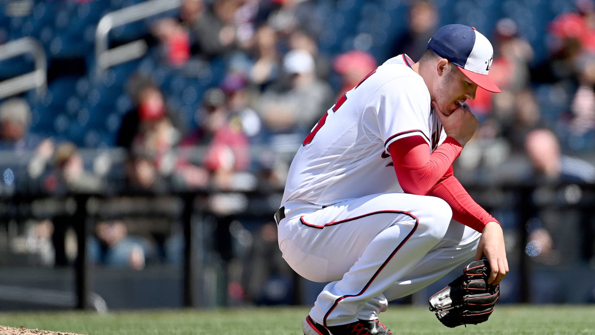 Patrick Corbin Crouching Down Background