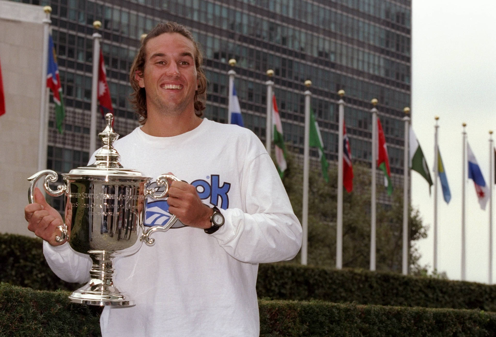 Patrick Rafter Holding Trophy Background