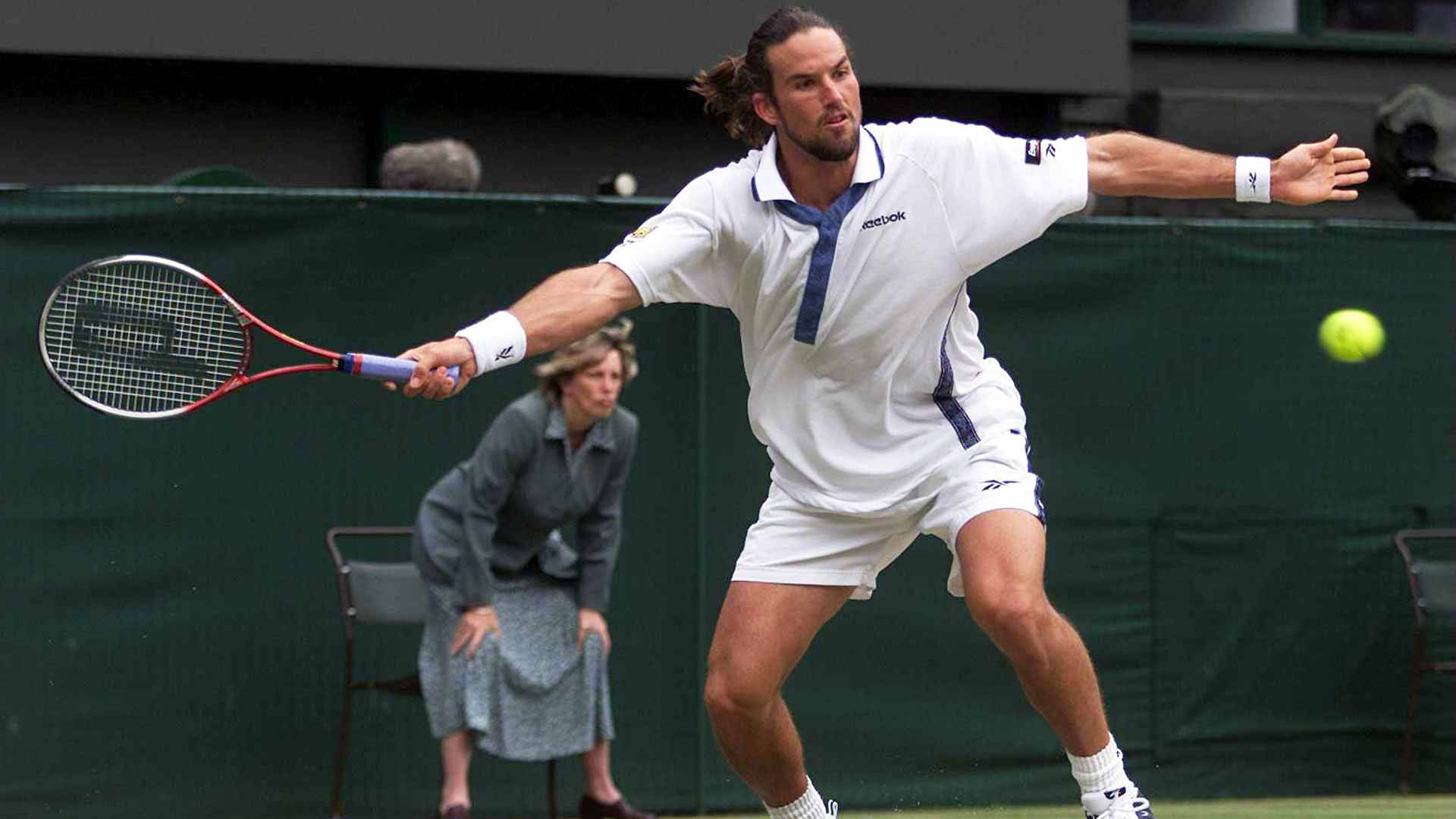 Patrick Rafter Showcasing Determination On The Field Background