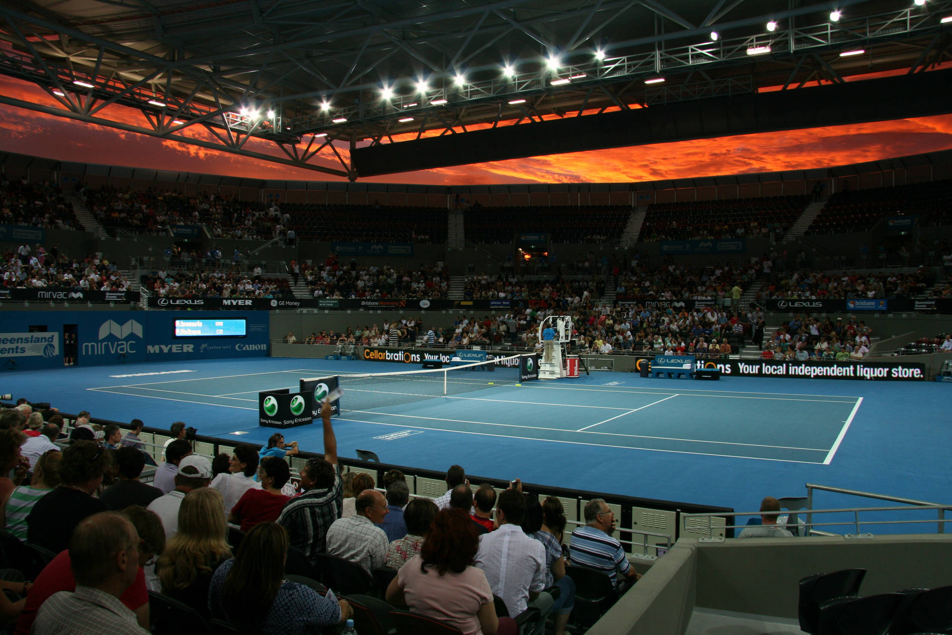 Patrick Rafter Showcasing His Skills In A Tennis Arena. Background