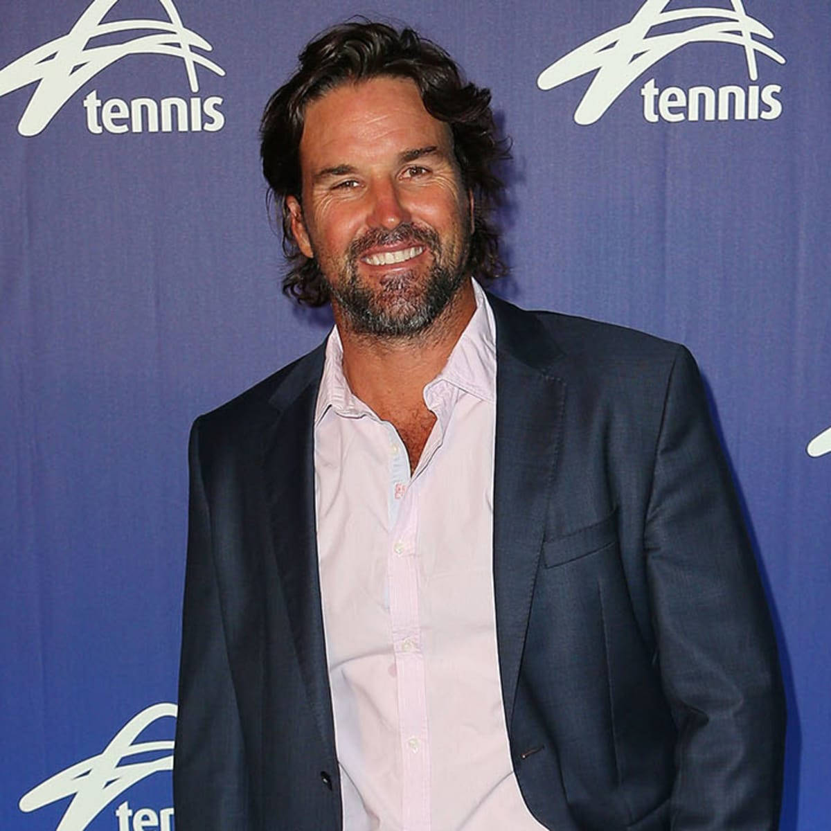 Patrick Rafter Wearing Blazer Event Background